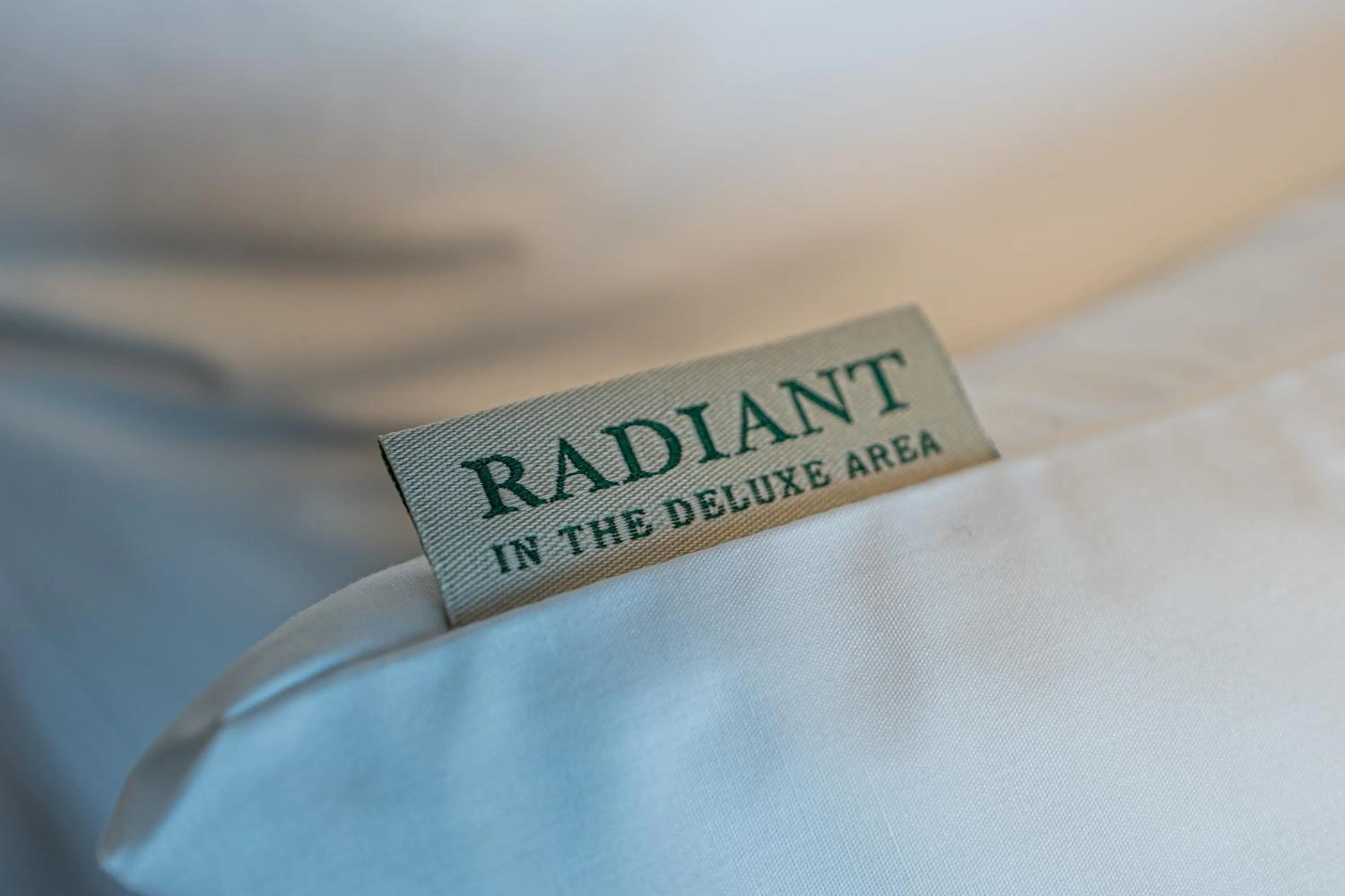 Bed in Radiant Nampo Hotel