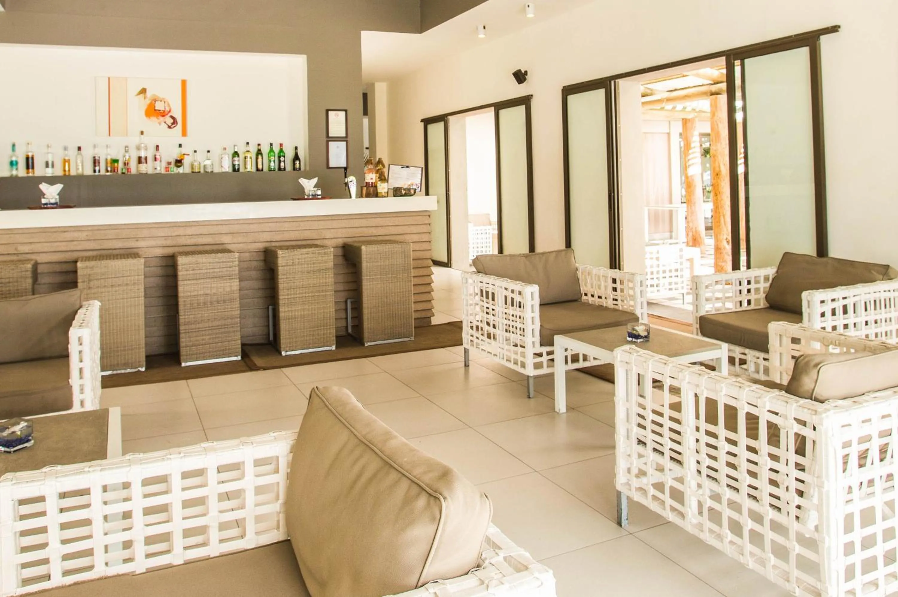 Lounge or bar in Crystals Beach Resort Belle Mare, a member of Radisson Individuals