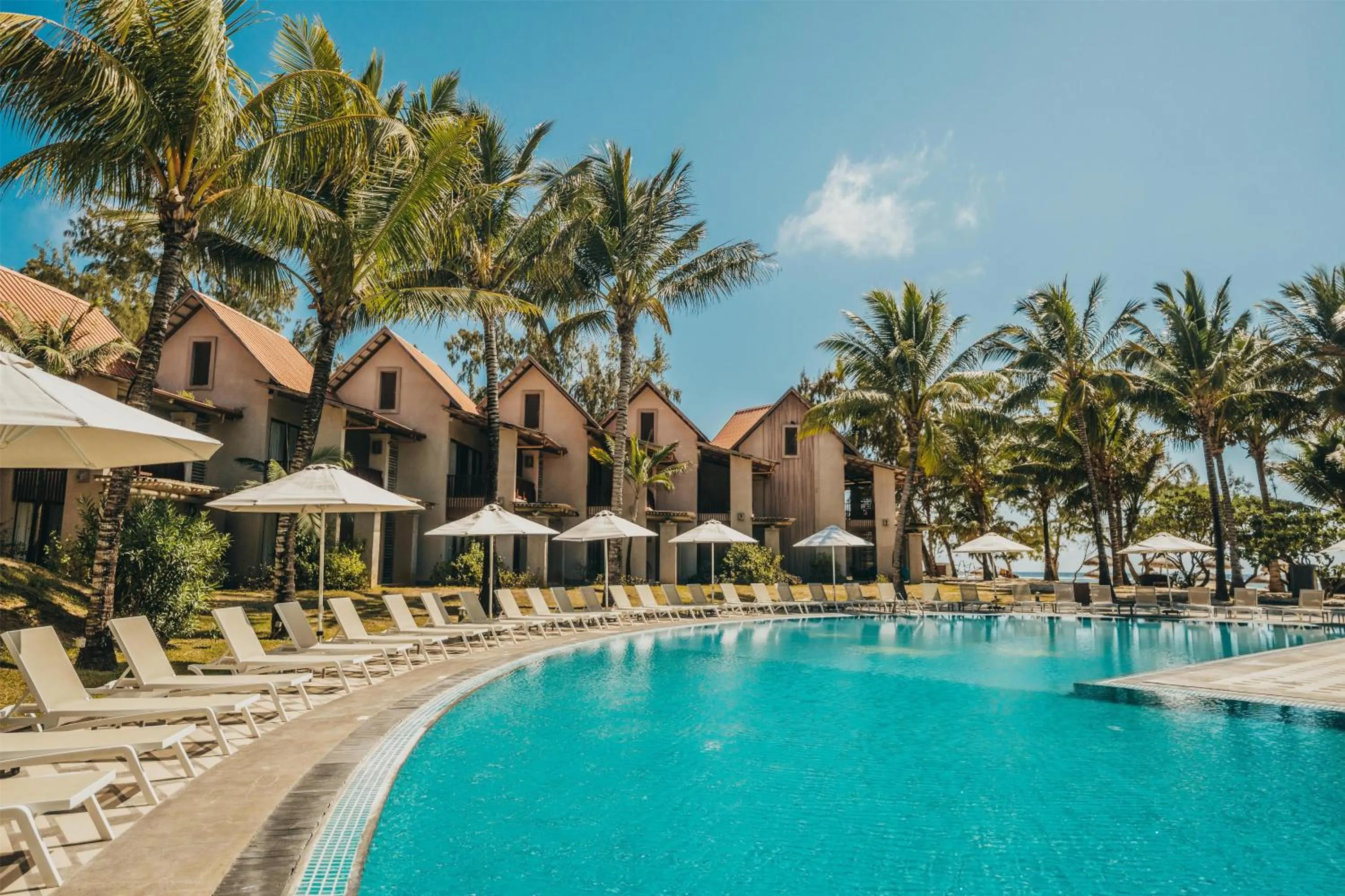 Pool view in Crystals Beach Resort Belle Mare, a member of Radisson Individuals