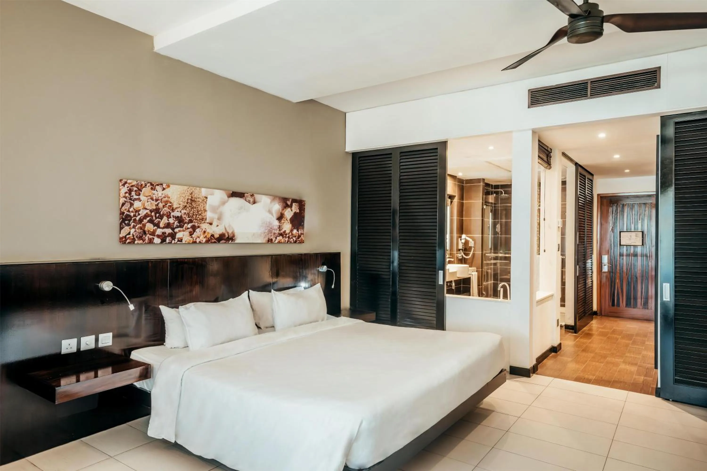 Bedroom, Bed in Crystals Beach Resort Belle Mare, a member of Radisson Individuals