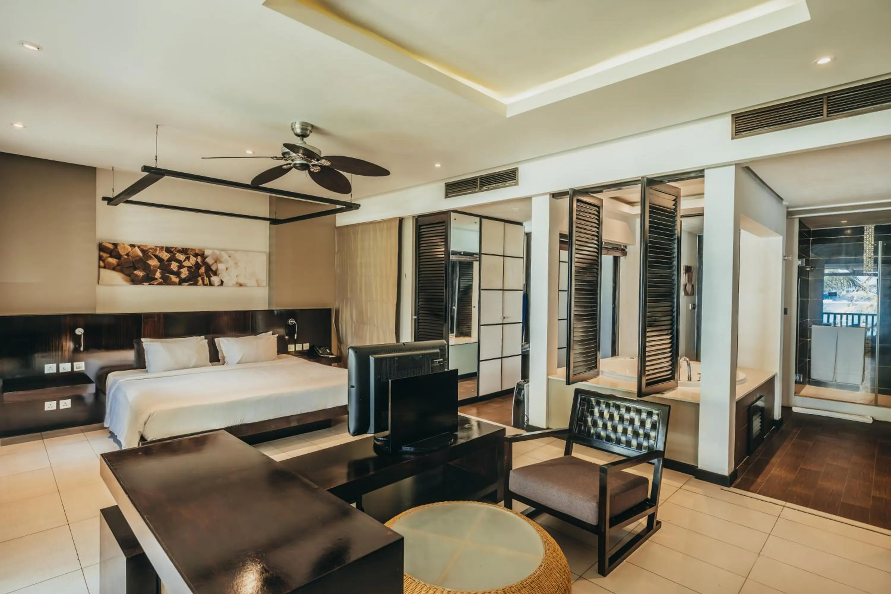 Bed in Crystals Beach Resort Belle Mare, a member of Radisson Individuals