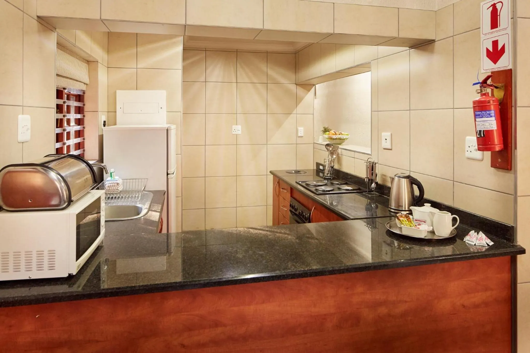 Kitchen or kitchenette in First Group Magalies Park
