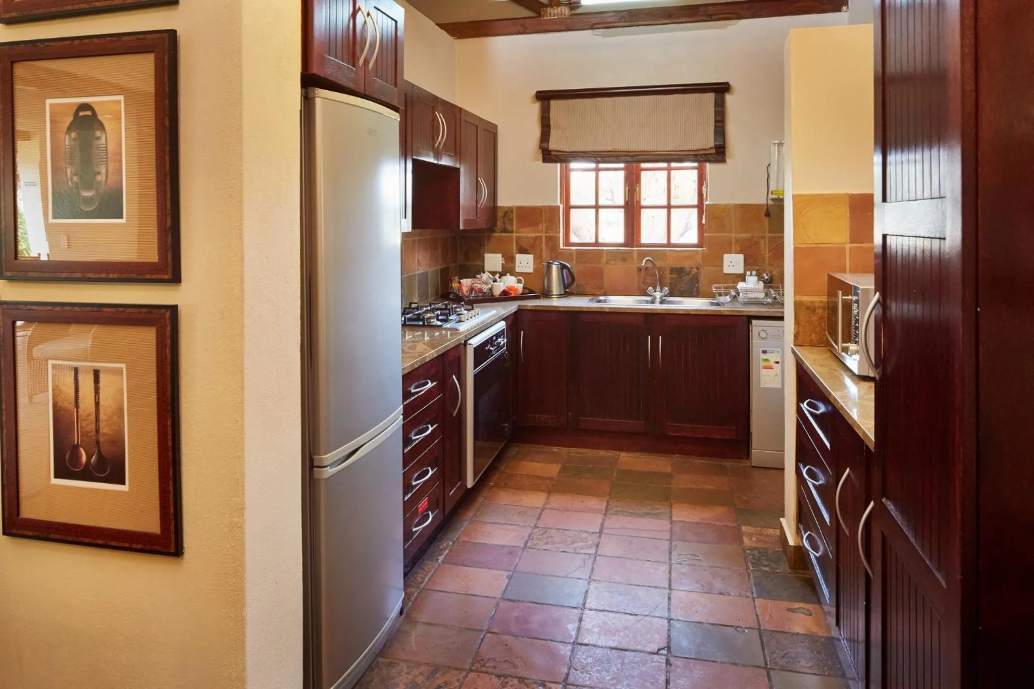 Kitchen or kitchenette in First Group Magalies Park