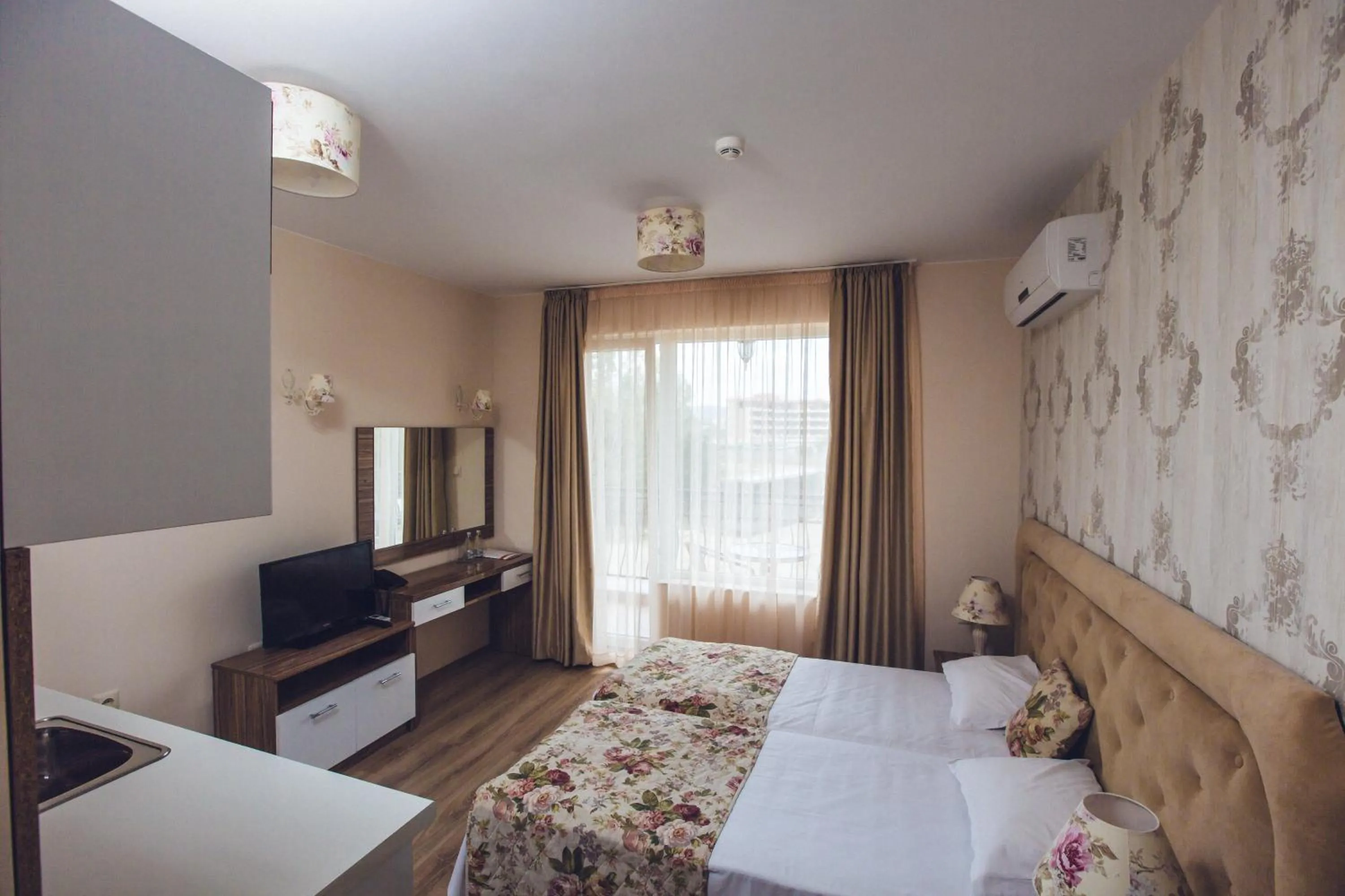 Bed in Avenue Deluxe Hotel