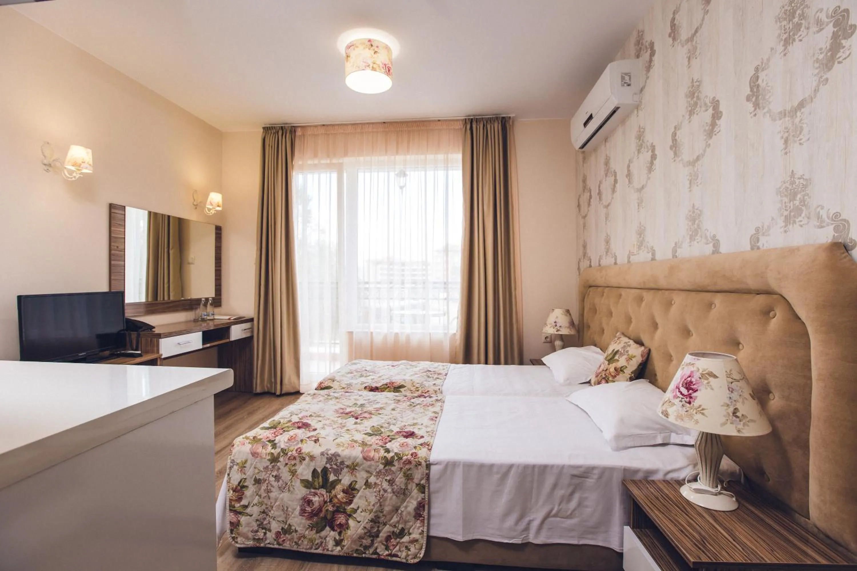 Bed in Avenue Deluxe Hotel