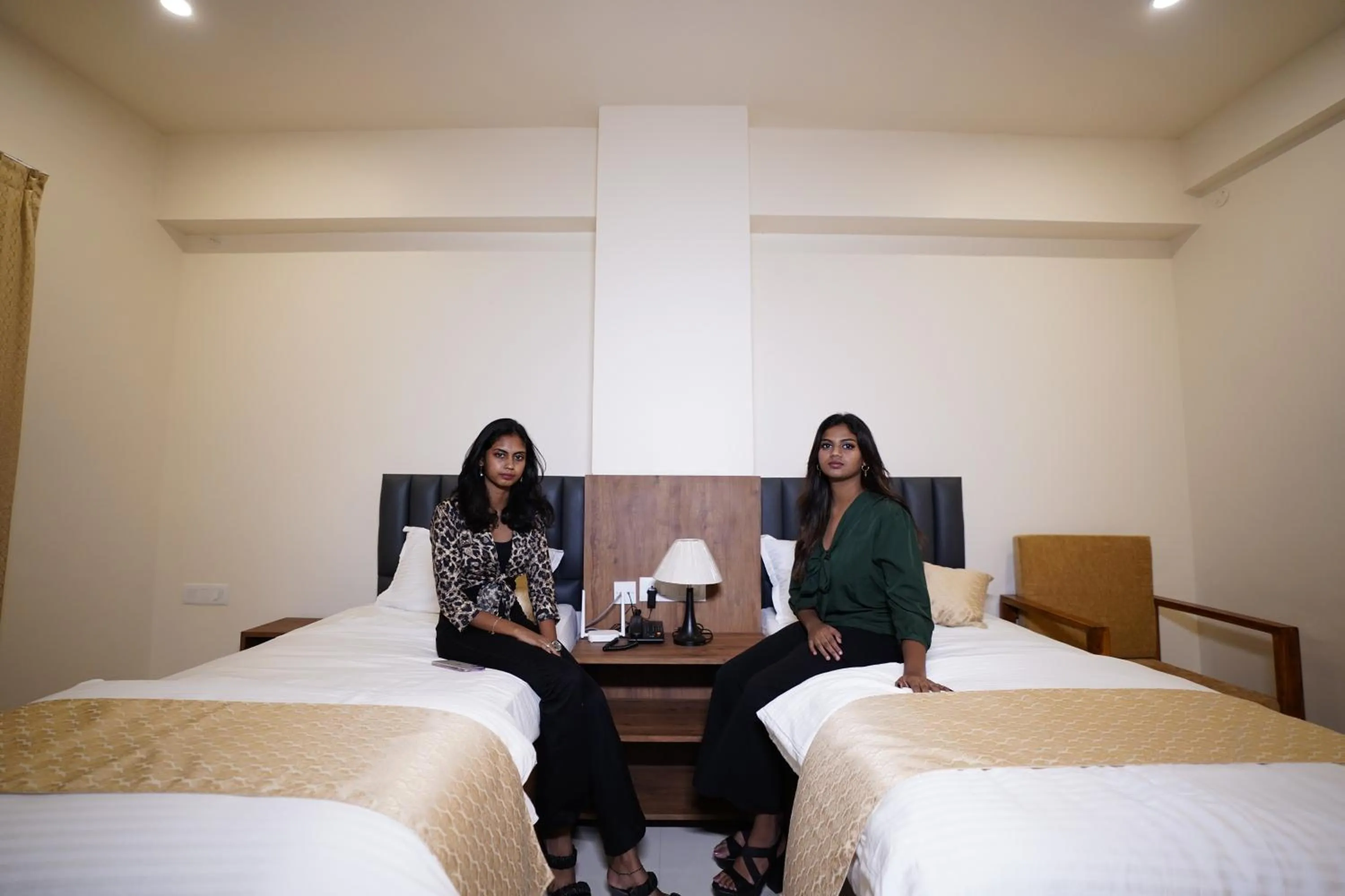 Bed in DrizzleDrop Inn Chennai