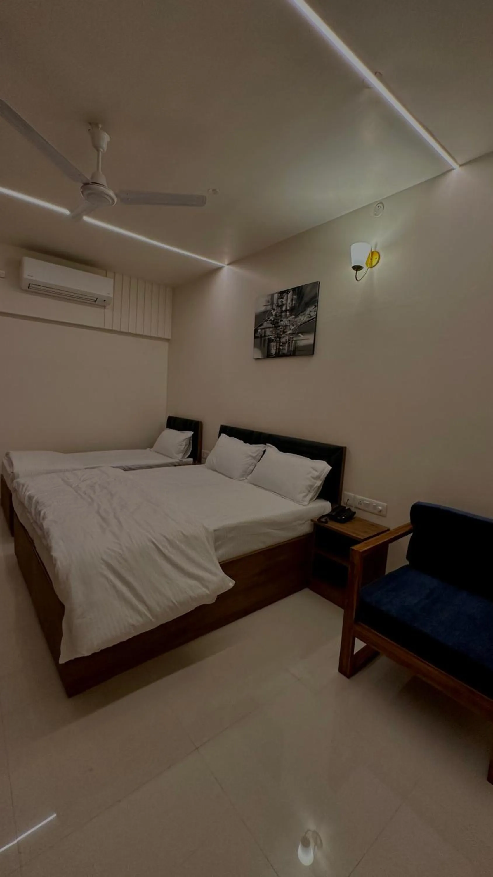 Bed in DrizzleDrop Inn Chennai