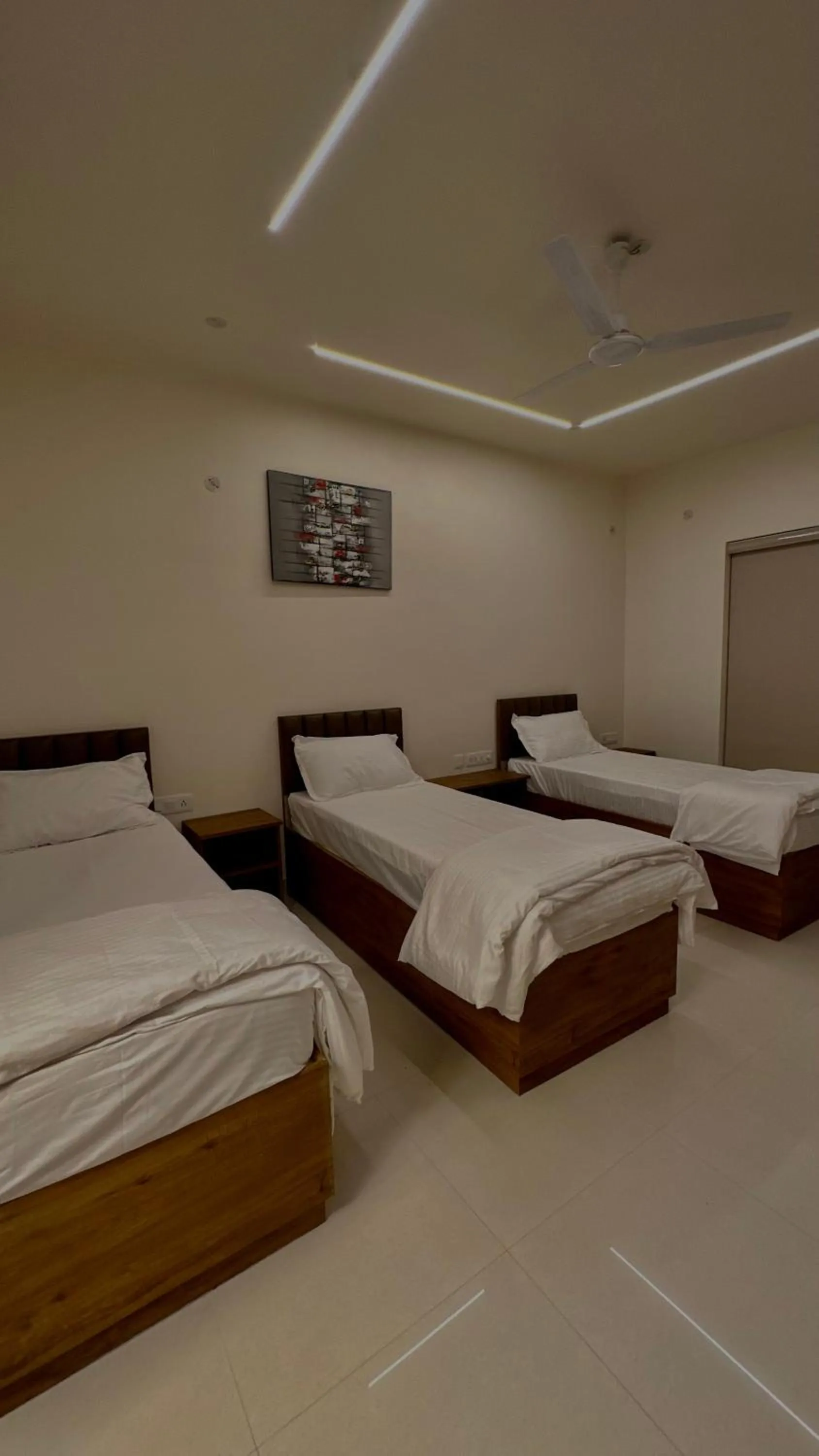 Bed in DrizzleDrop Inn Chennai