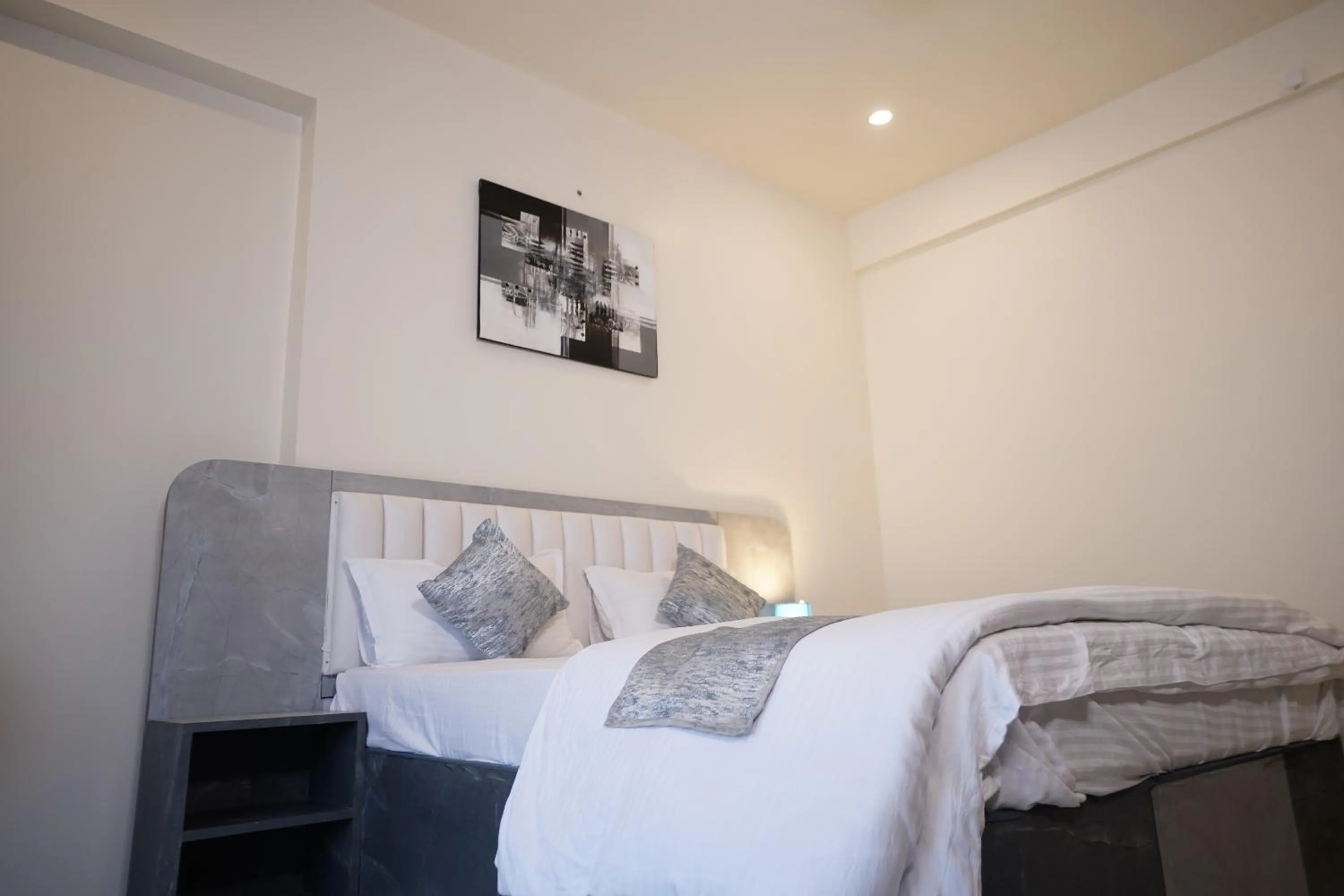 Bed in DrizzleDrop Inn Chennai