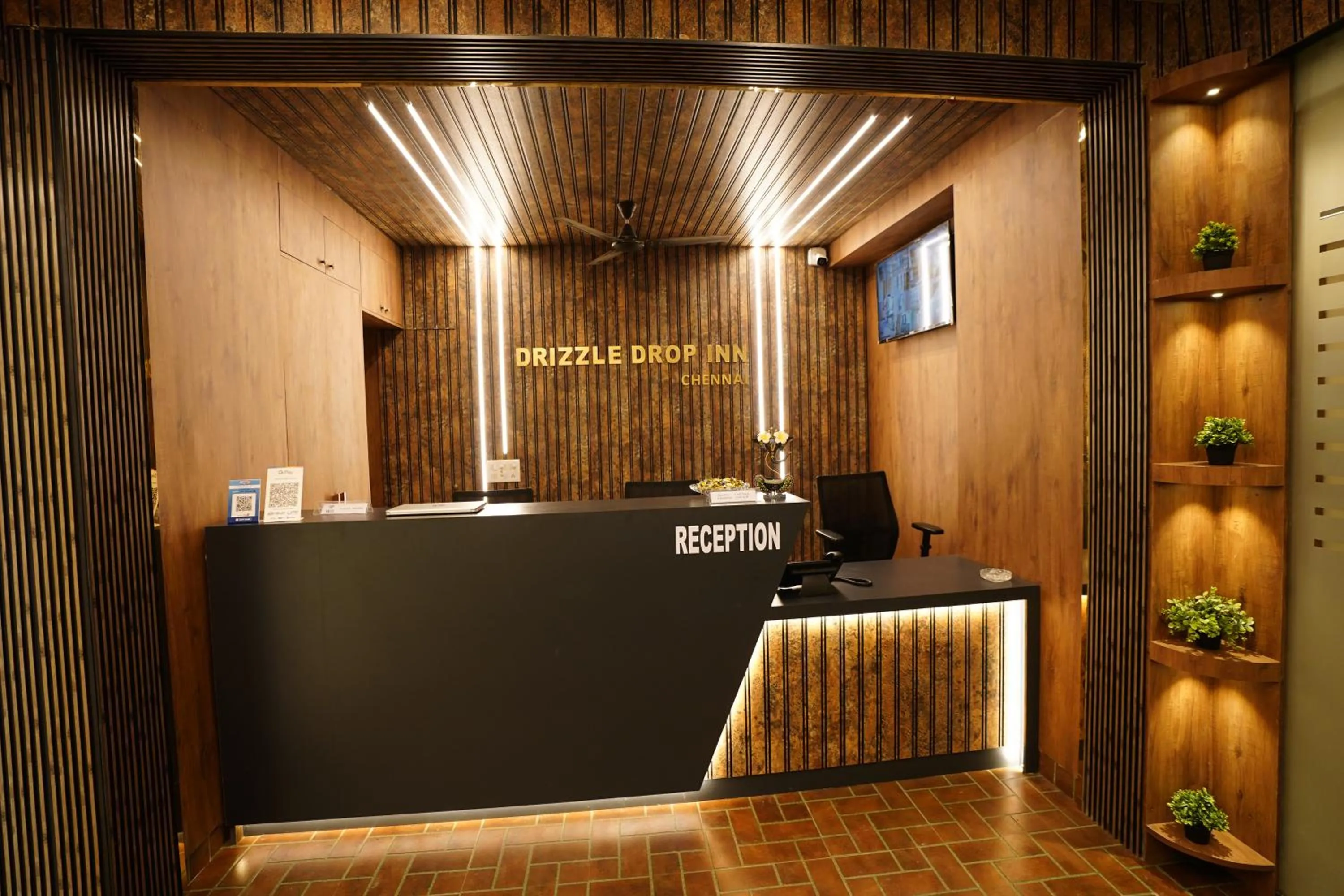 Property logo or sign in DrizzleDrop Inn Chennai