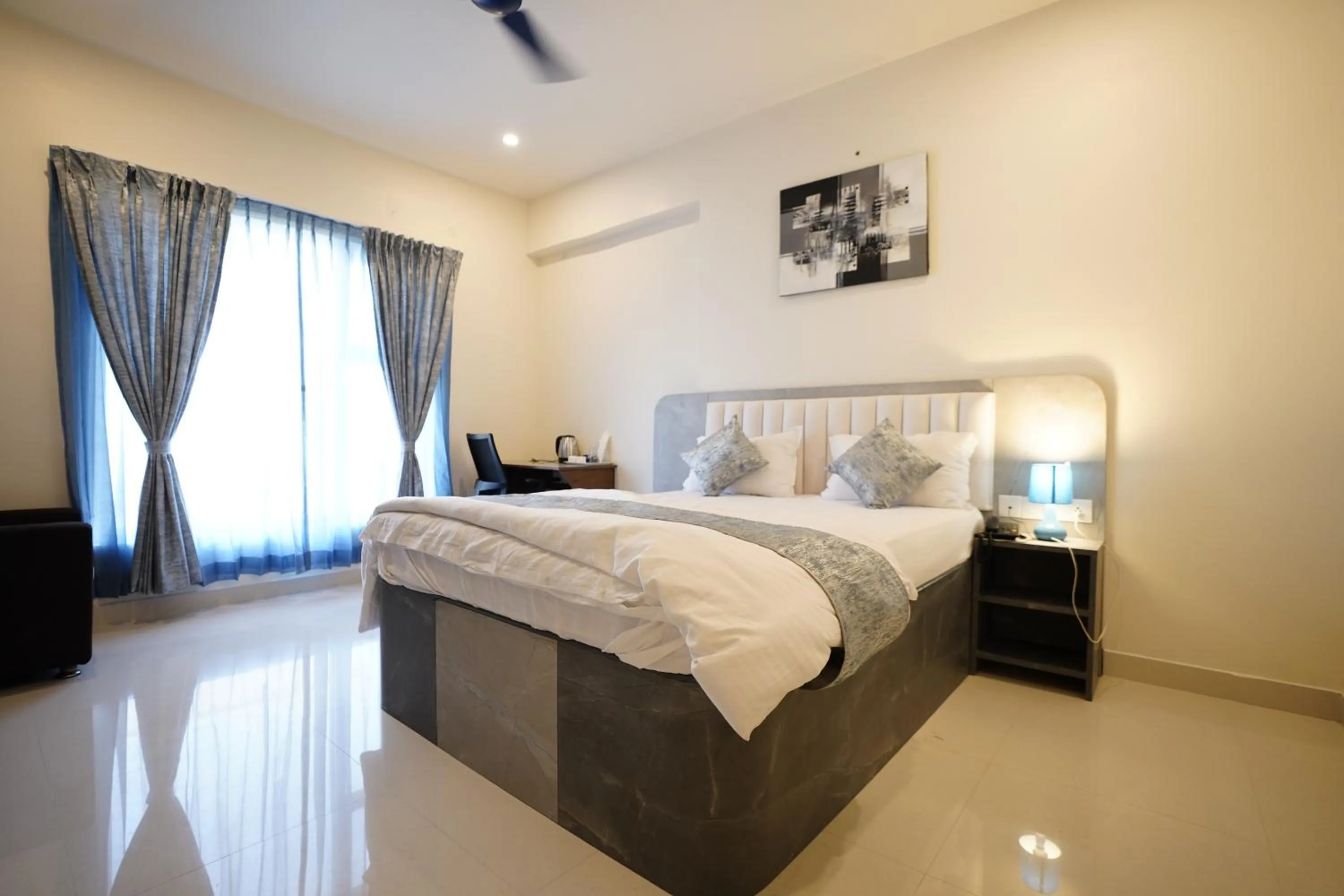 Bed in DrizzleDrop Inn Chennai