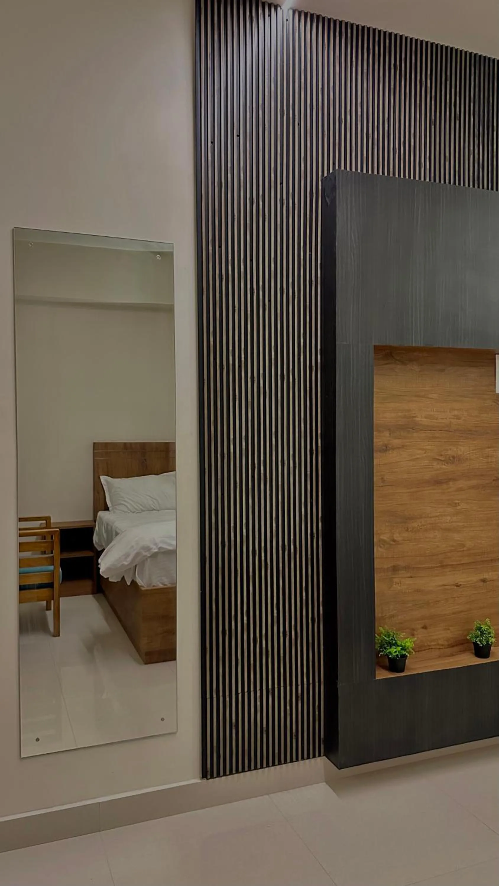 Bed in DrizzleDrop Inn Chennai