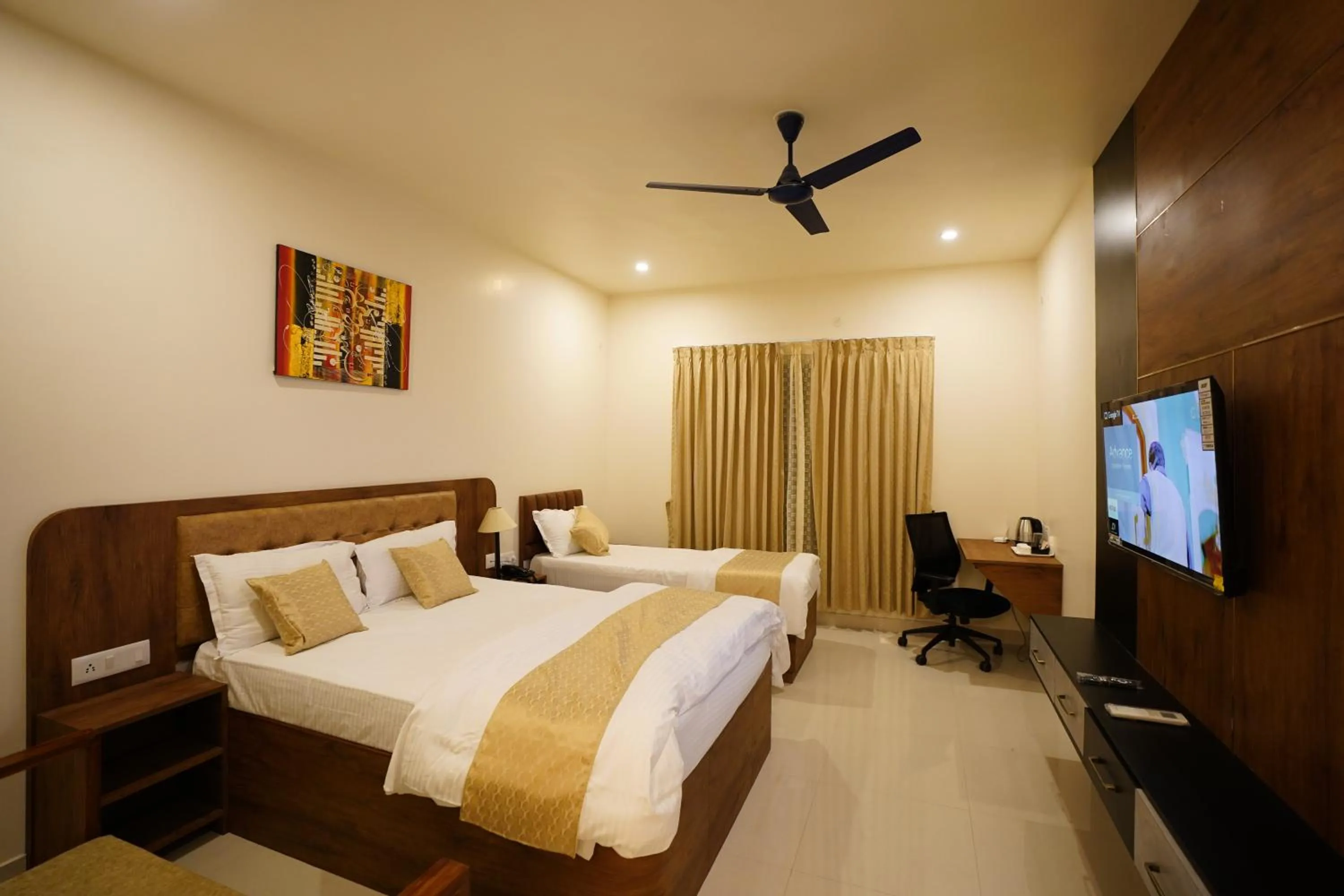 Bed in DrizzleDrop Inn Chennai