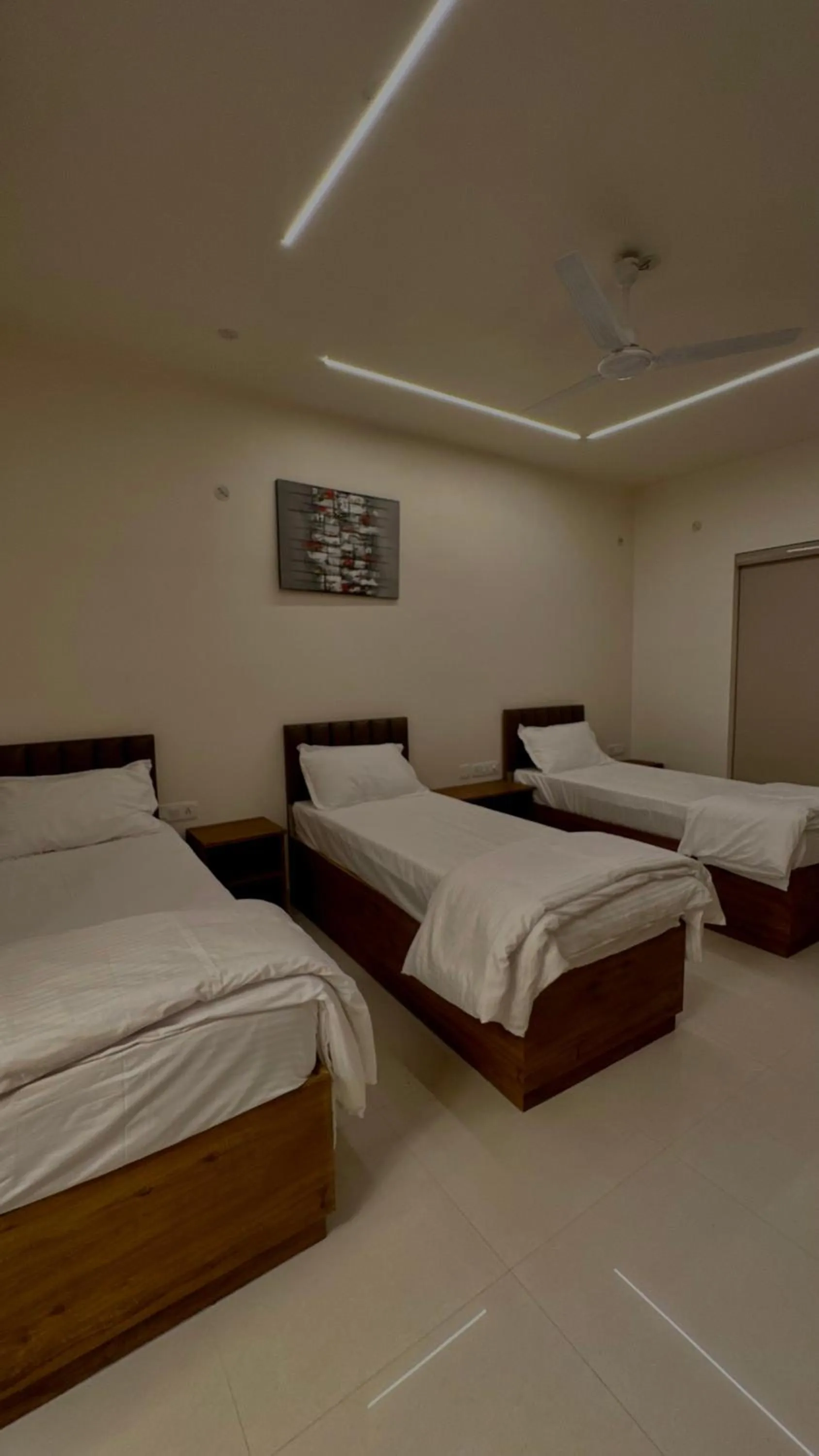 Bed in DrizzleDrop Inn Chennai