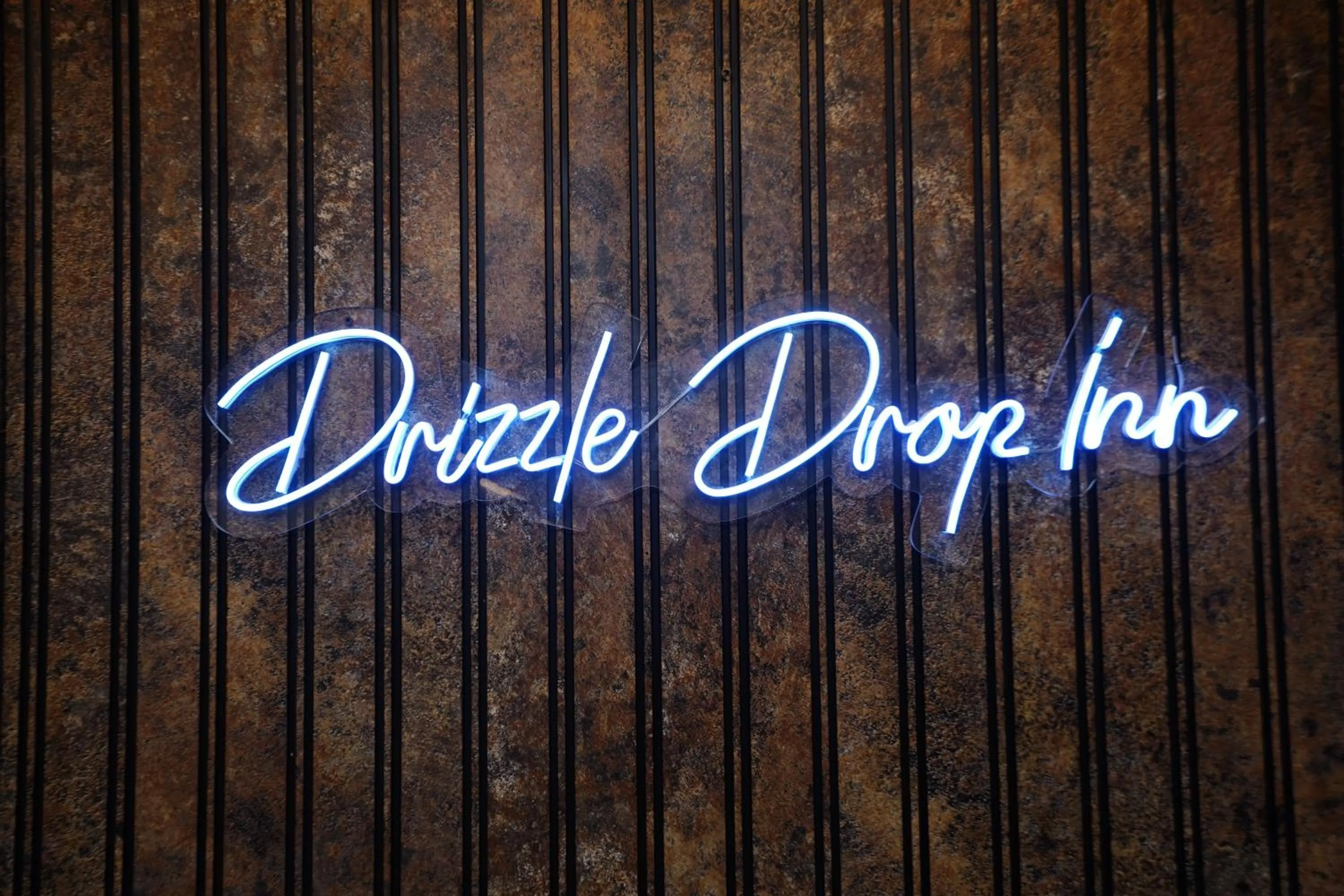 Property logo or sign in DrizzleDrop Inn Chennai