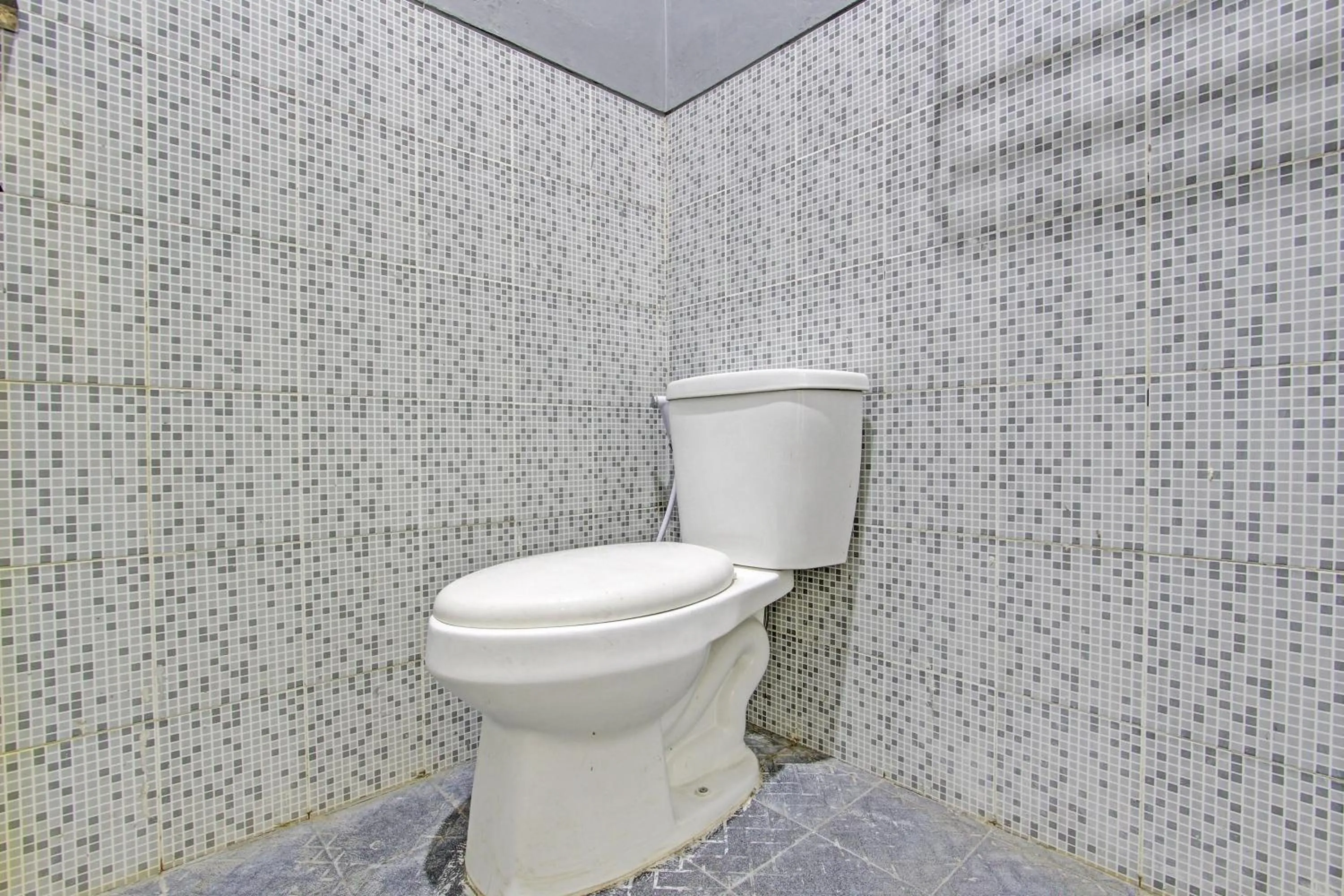 Bathroom in Super OYO Capital O 93204 Hotel Mulia Dua Syariah