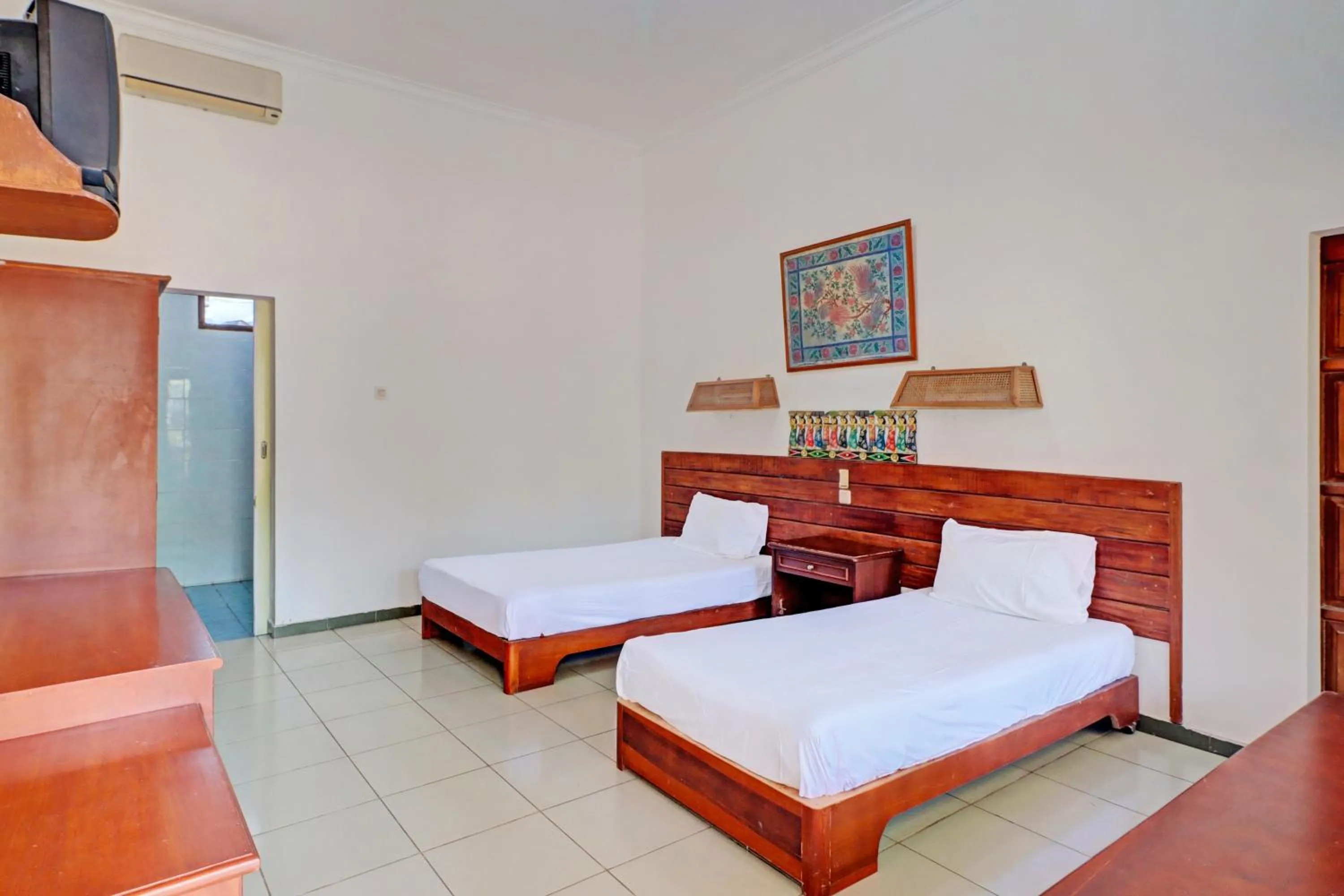 Bedroom, Bed in Capital O 93236 Hotel Hapel Negara