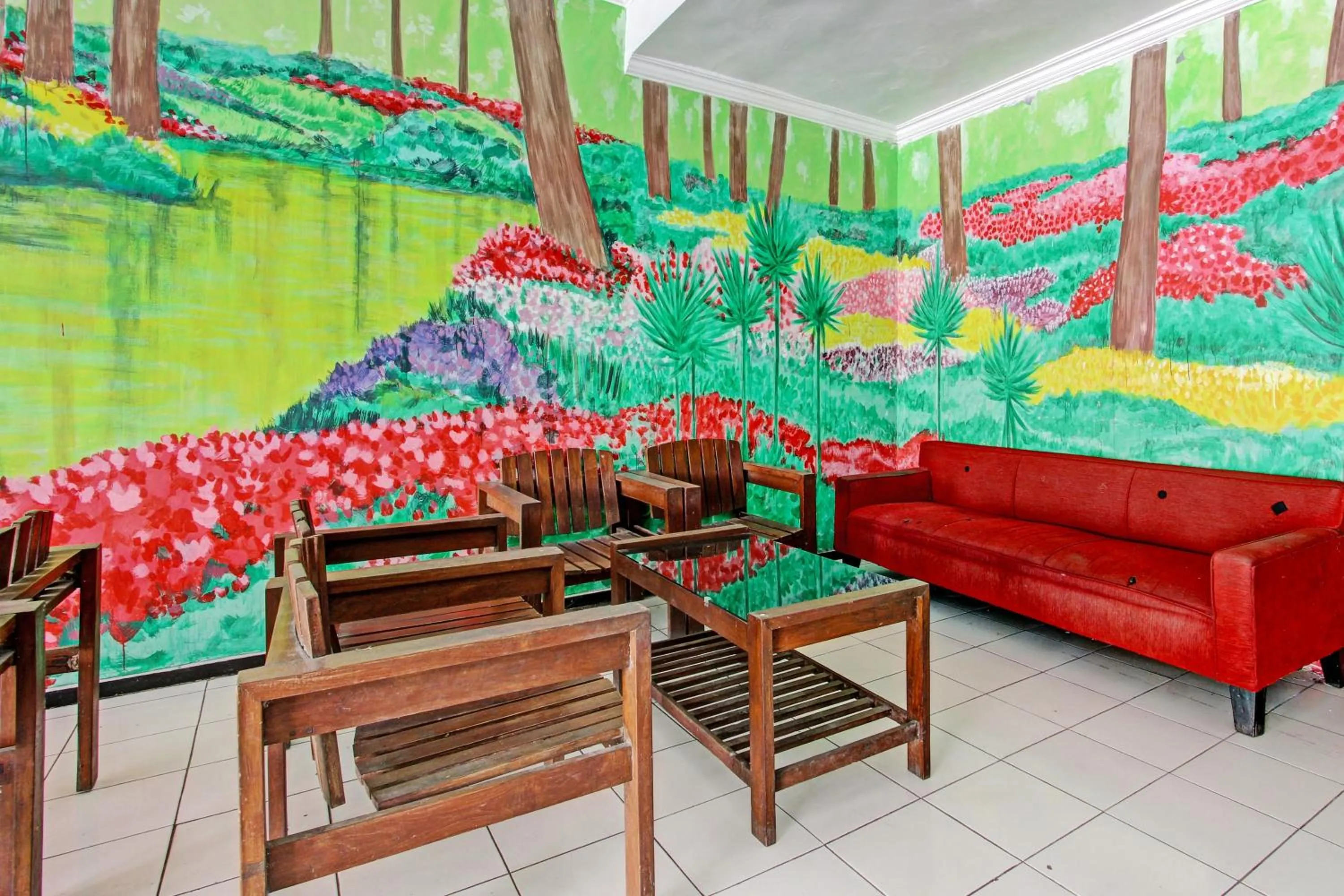 Lobby or reception in Super OYO Capital O 93240 Candra Dewi Hotel