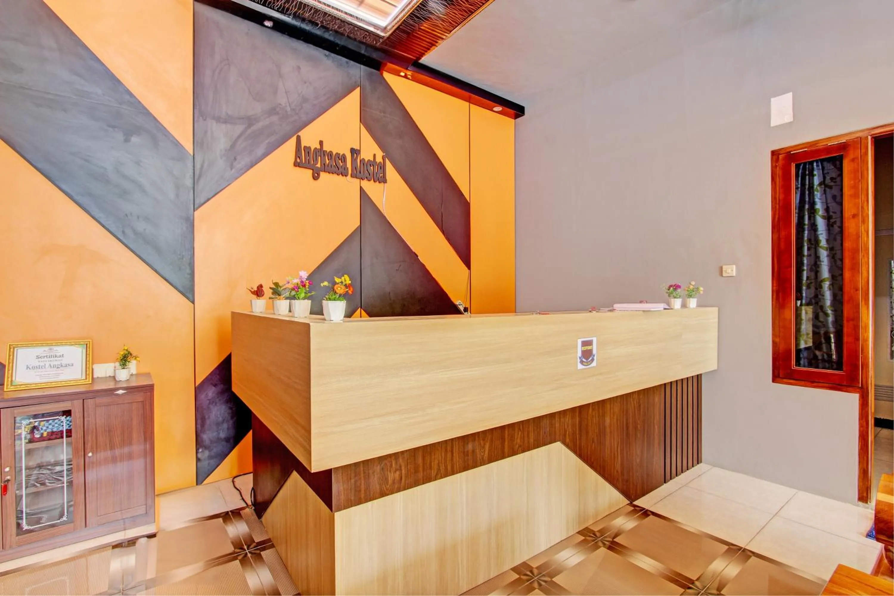 Lobby or reception in Capital O 93244 Angkasa Inn