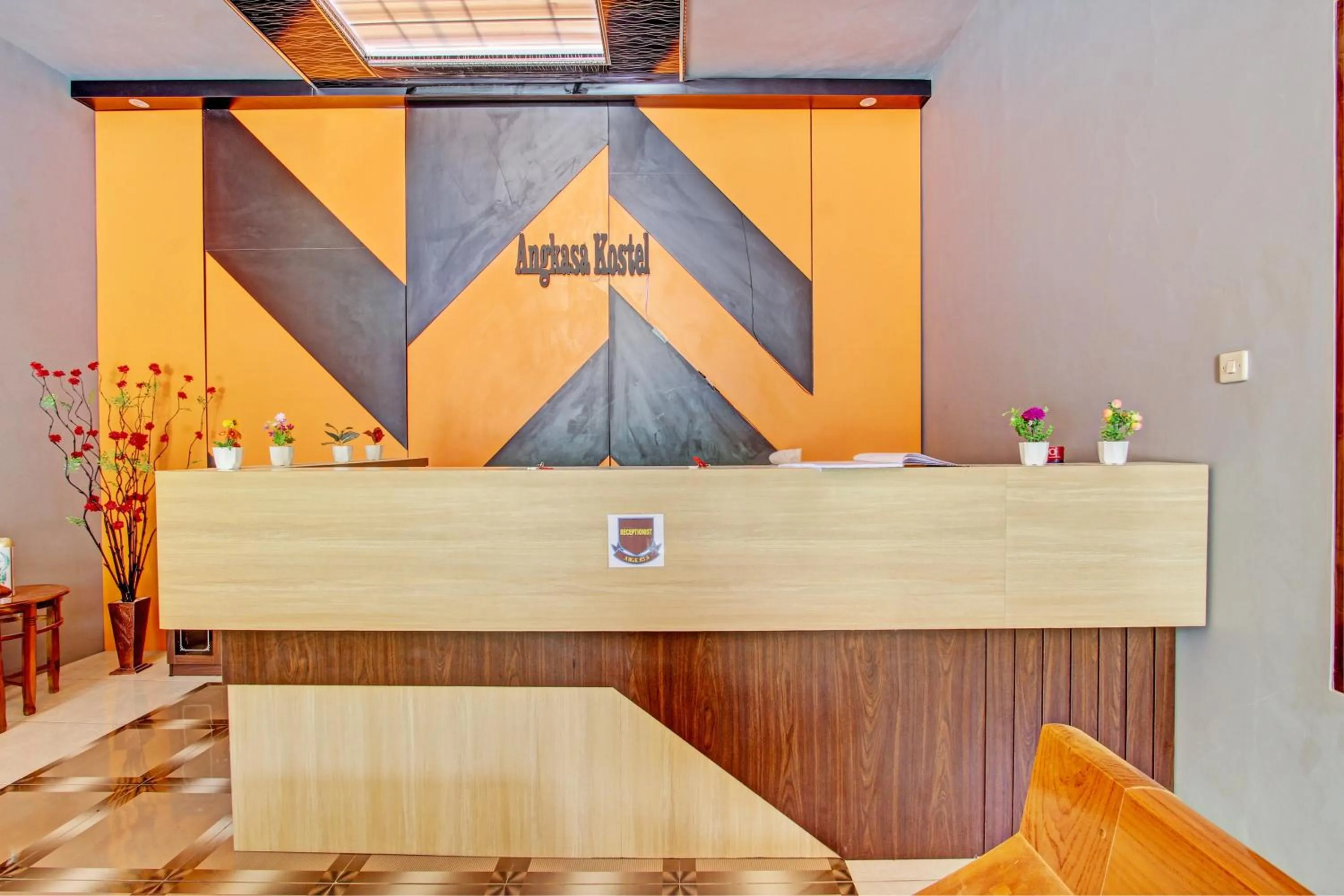 Lobby or reception in Capital O 93244 Angkasa Inn