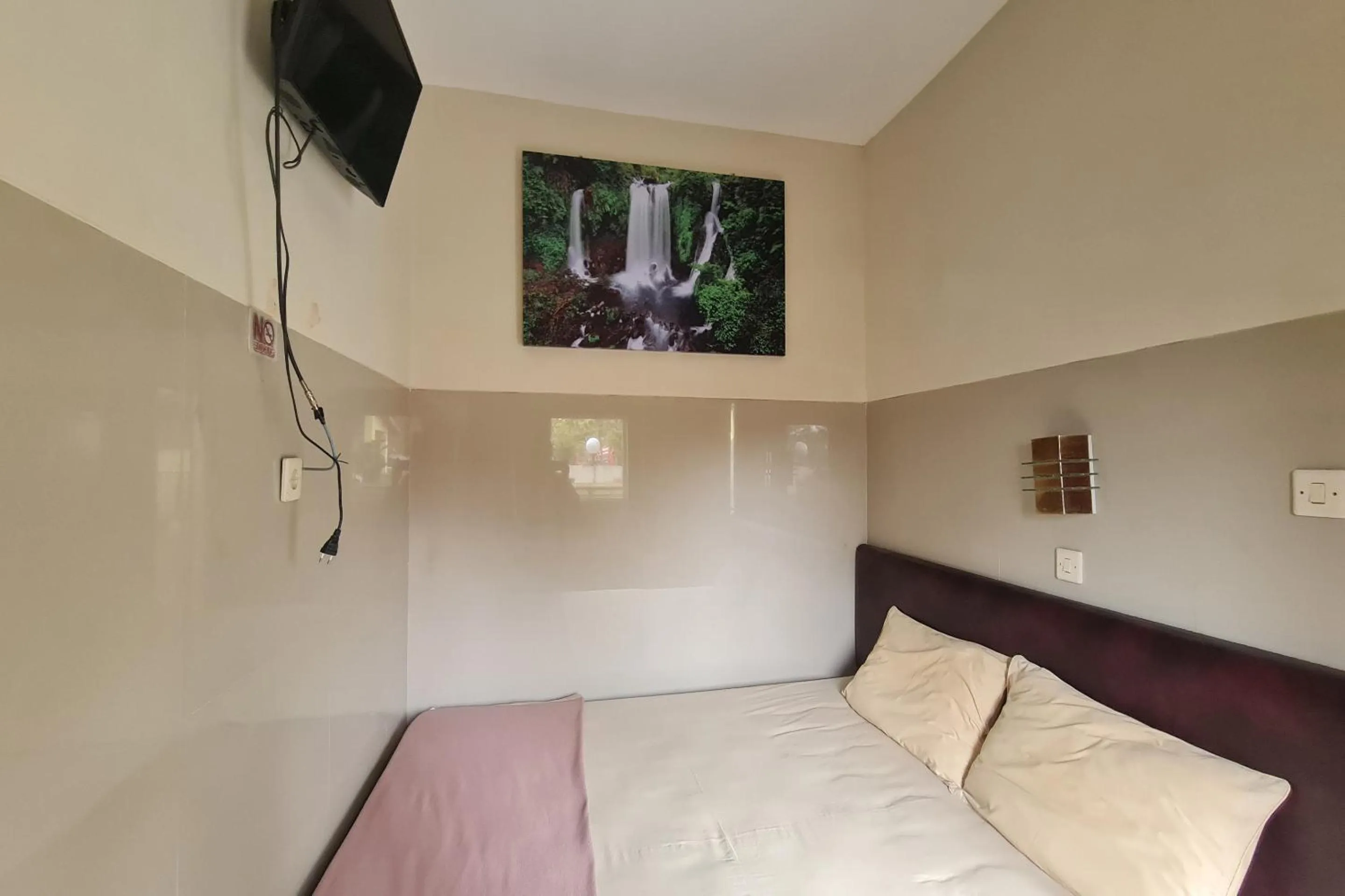 Bedroom, Bed in Capital O 93250 Hotel Tirta Kencana 2 Baturaden