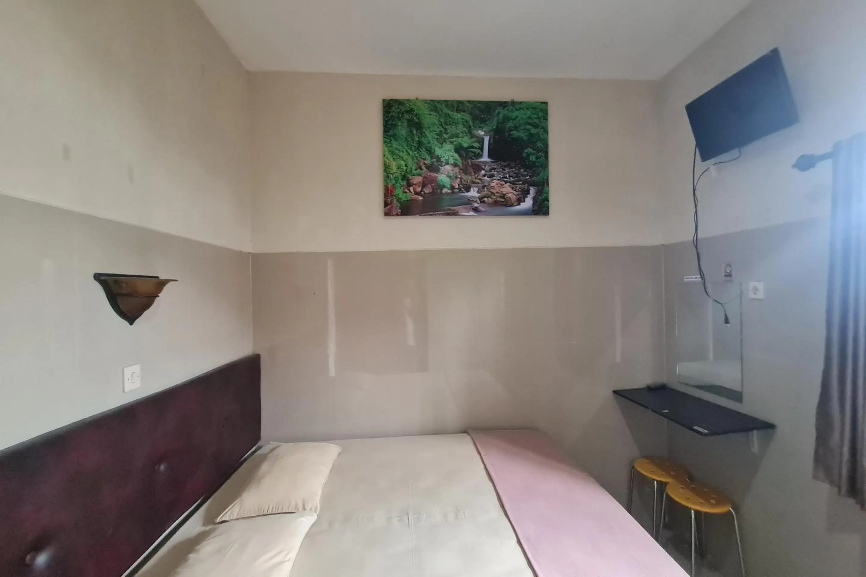 Bedroom, Bed in Capital O 93250 Hotel Tirta Kencana 2 Baturaden