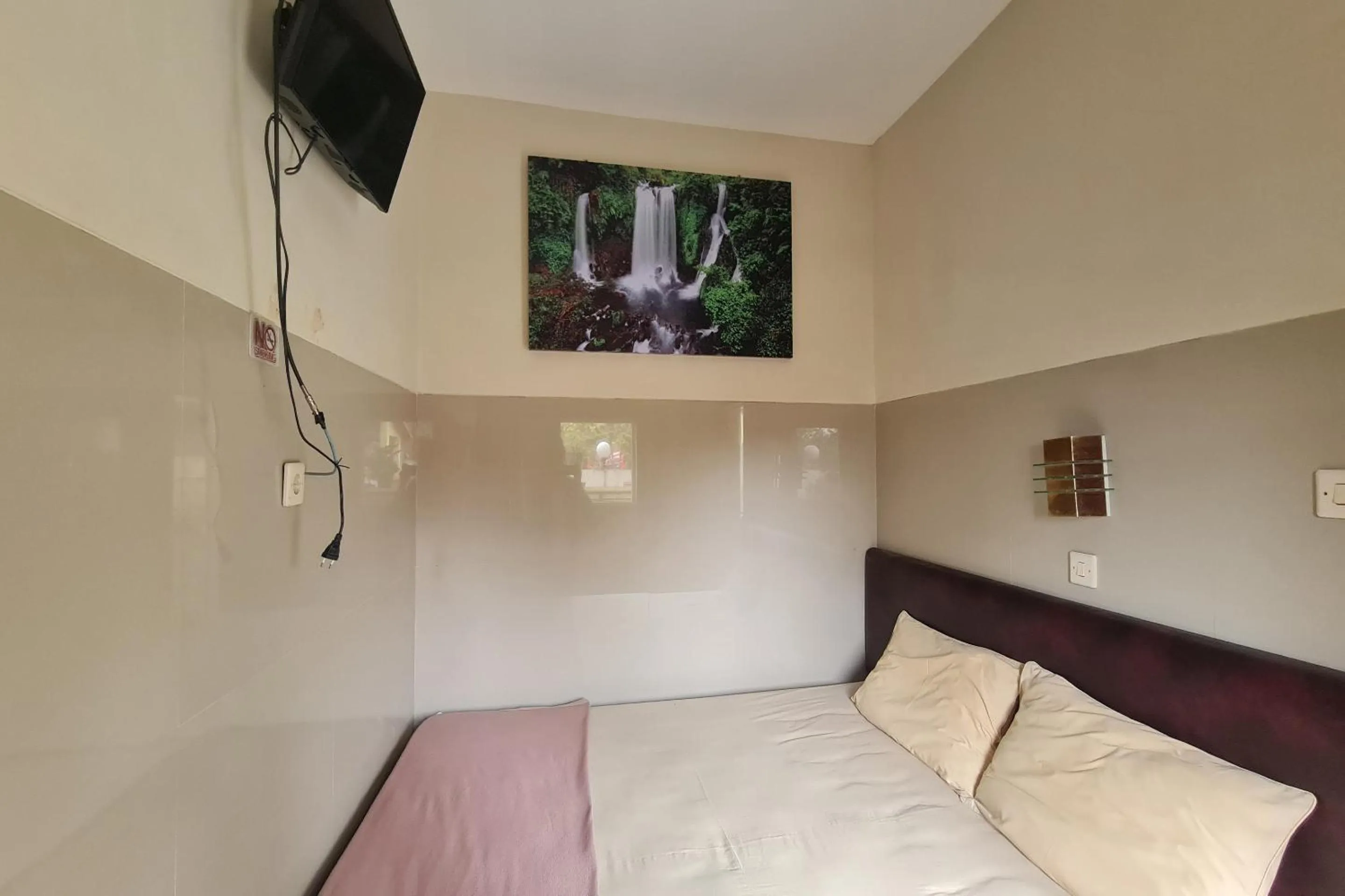 Bedroom, Bed in Capital O 93250 Hotel Tirta Kencana 2 Baturaden