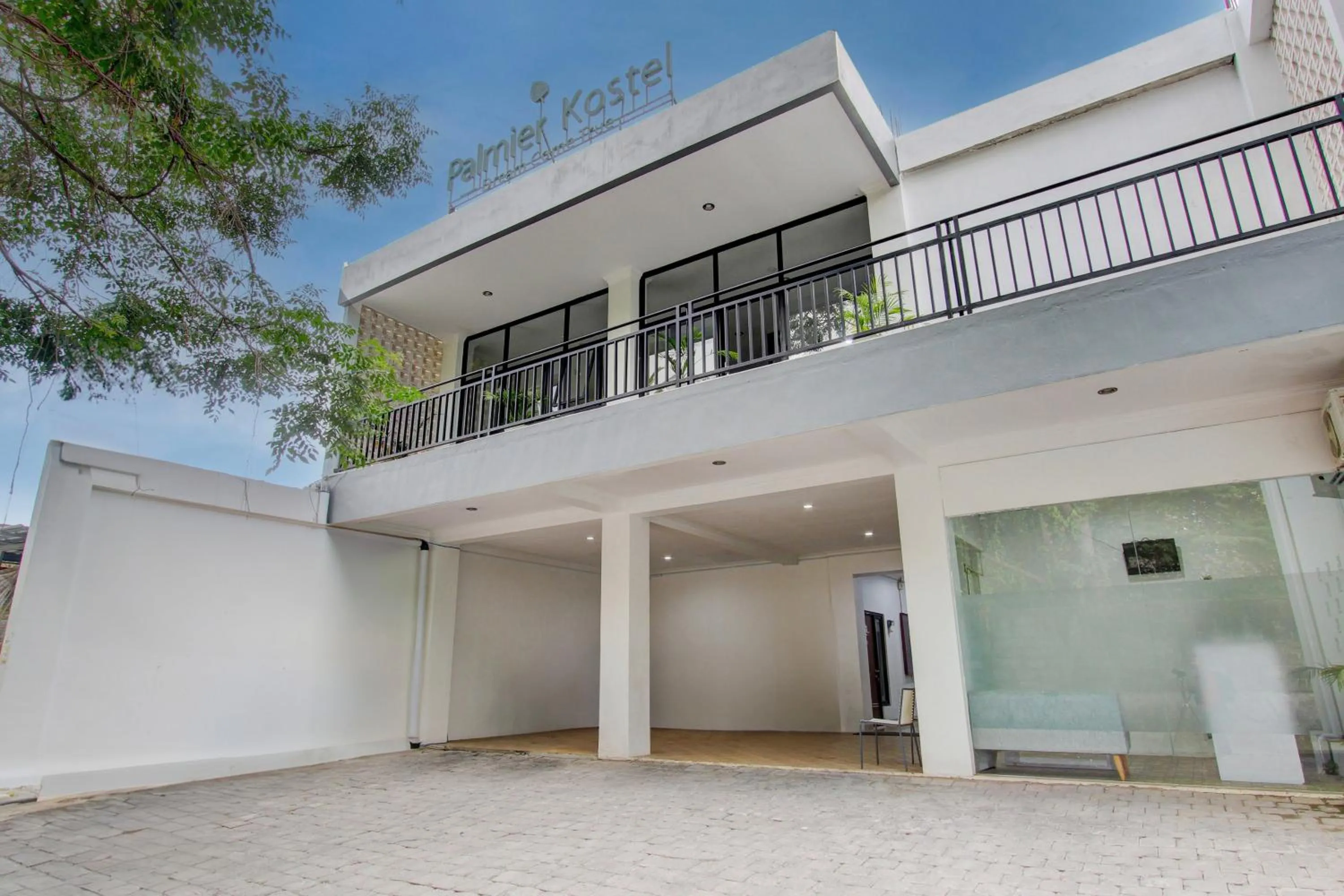 Facade/entrance in Capital O 93266 Palmier Hotel