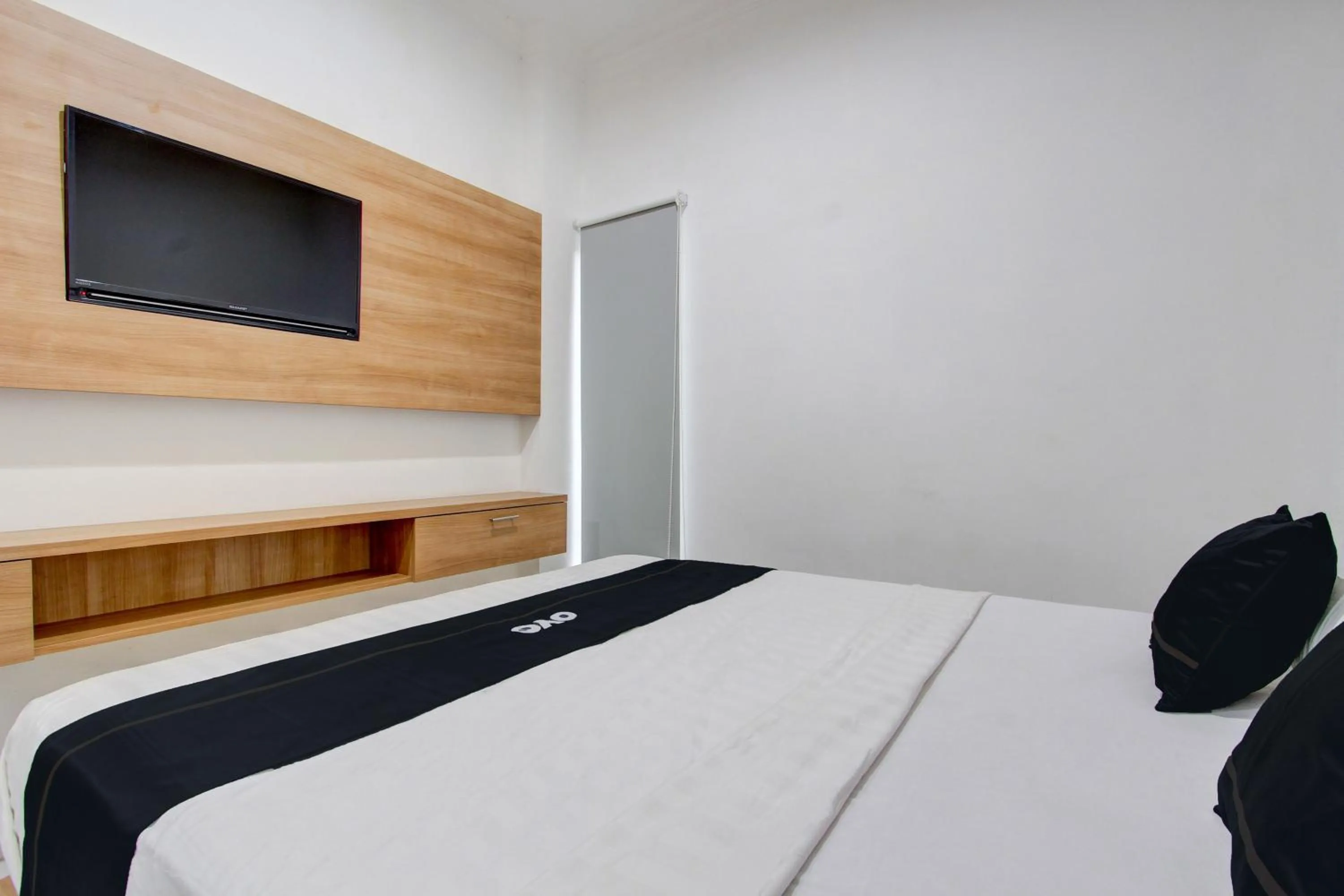 Bedroom in Capital O 93266 Palmier Hotel