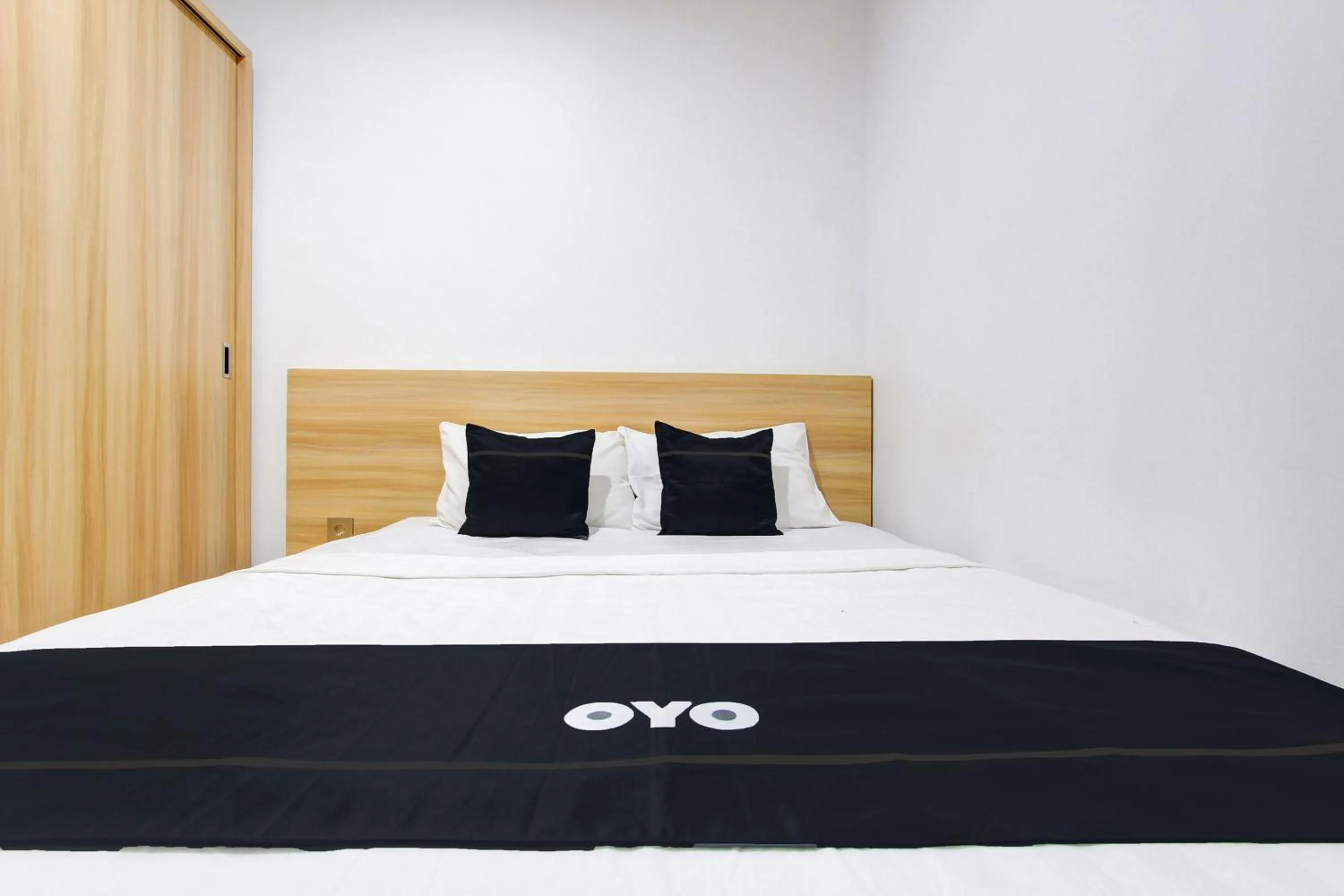 Bedroom in Capital O 93266 Palmier Hotel