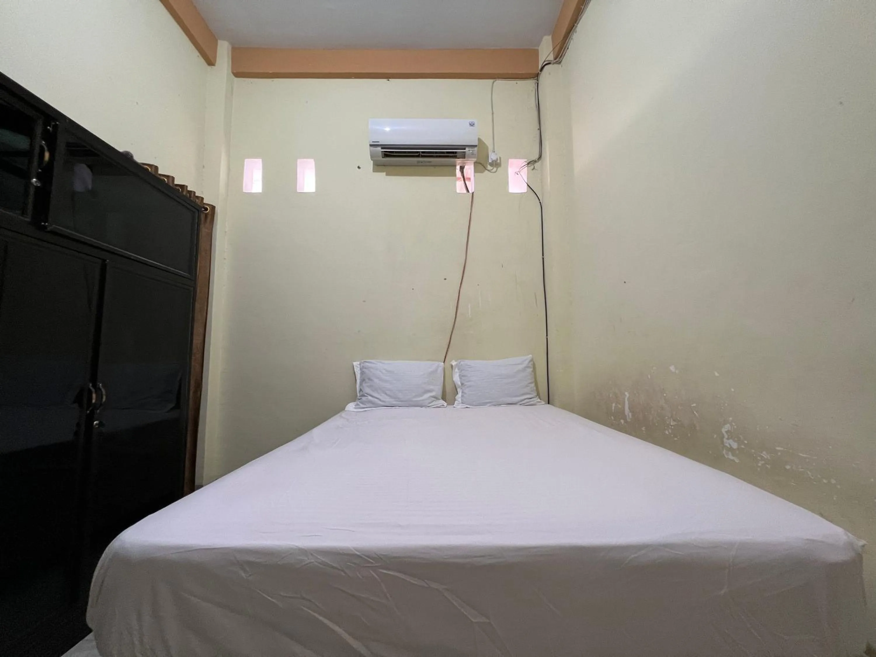 Bedroom, Bed in Hotel O Mely Homestay