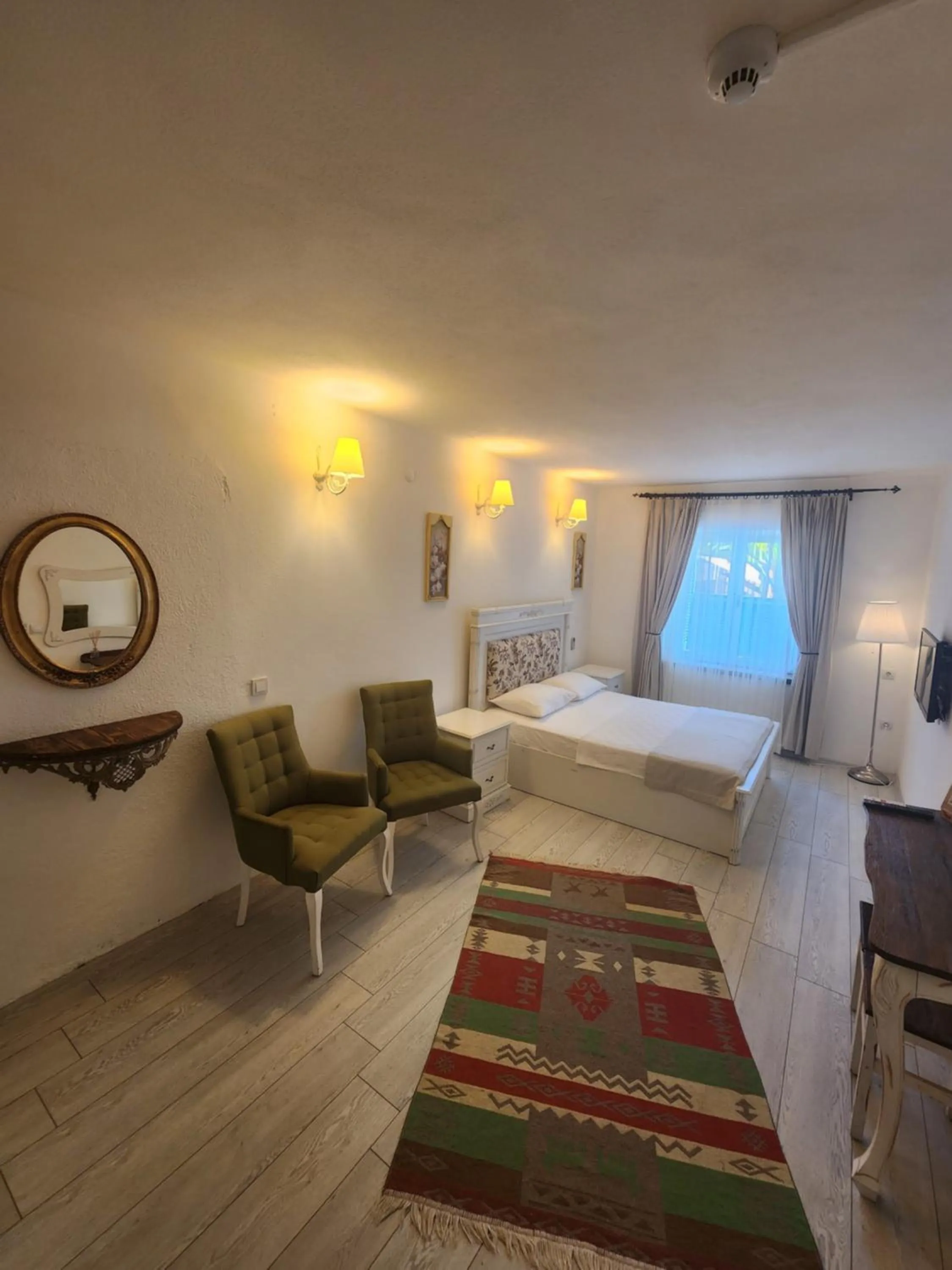 Bed in Tarcin Alacati Hotel