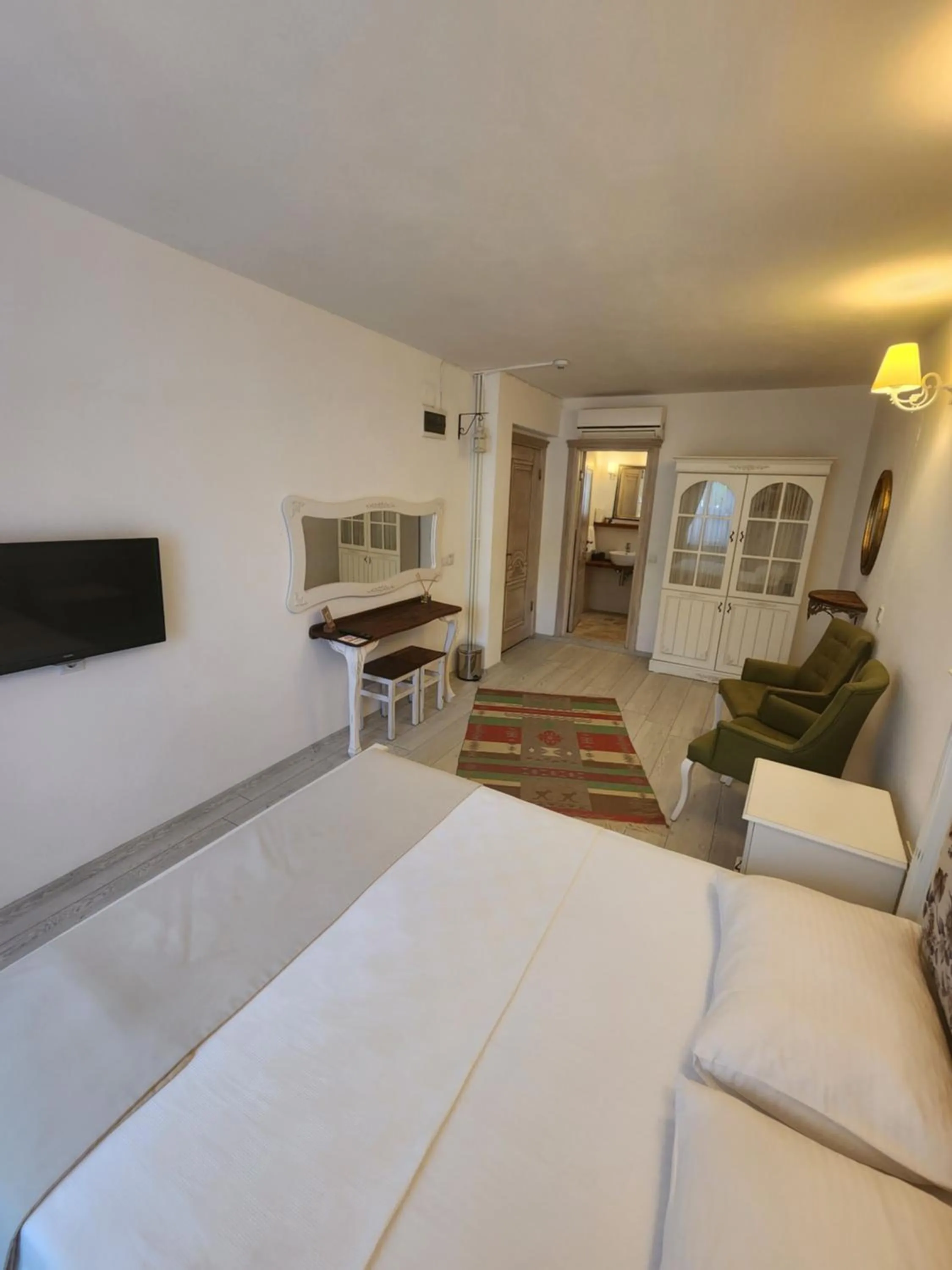 Bed in Tarcin Alacati Hotel