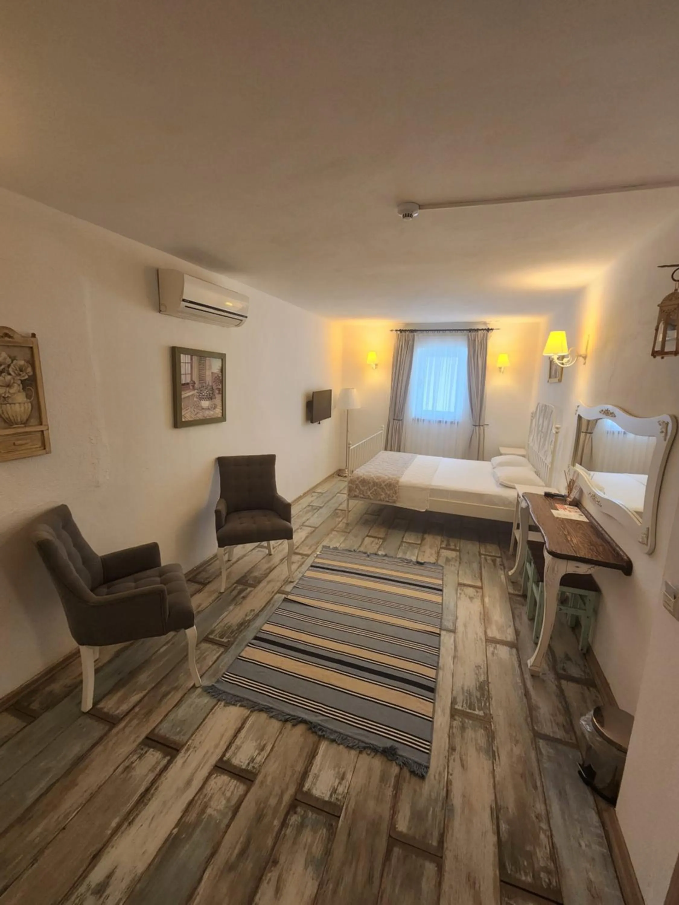 Bed in Tarcin Alacati Hotel