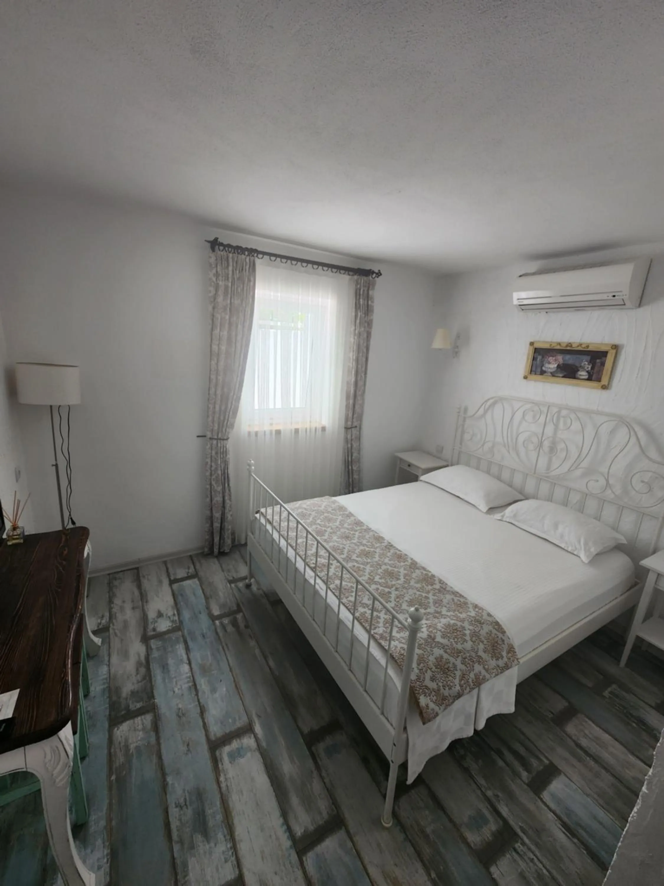 Bed in Tarcin Alacati Hotel