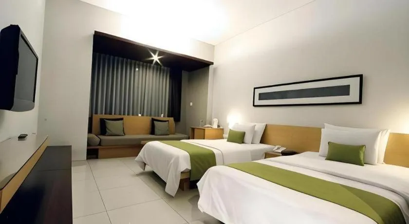 Bed in Mitra Bandung Hotel