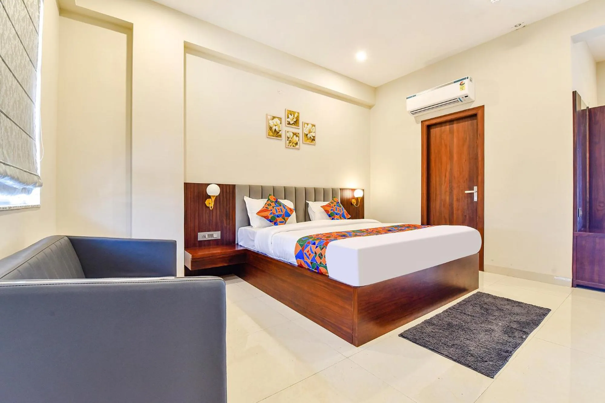 Bed in FabHotel Pravaasam Residency