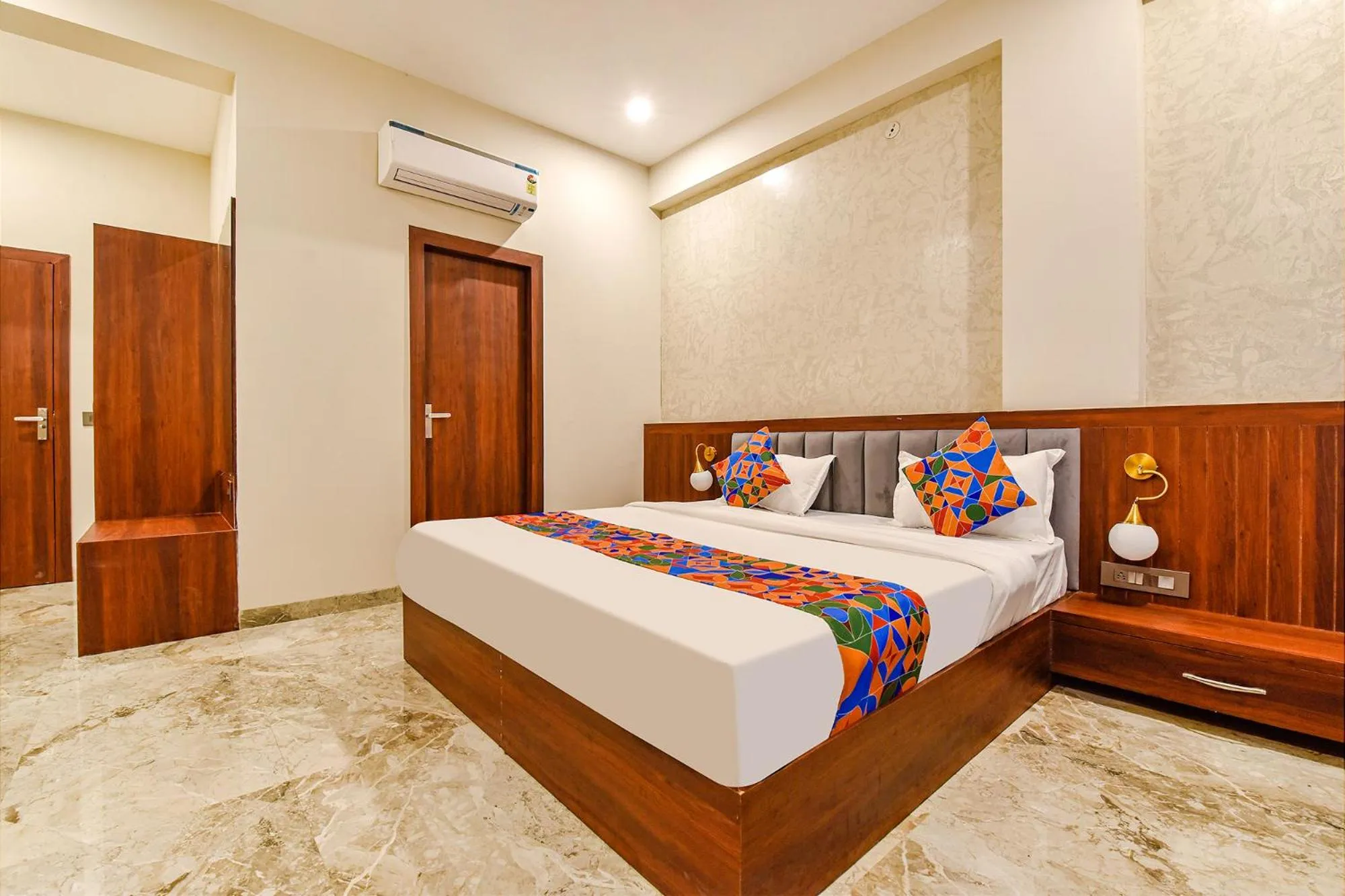 Bed in FabHotel Pravaasam Residency