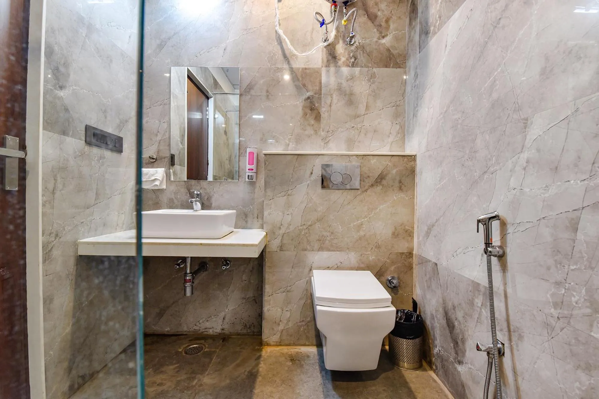 Bathroom in FabHotel Pravaasam Residency