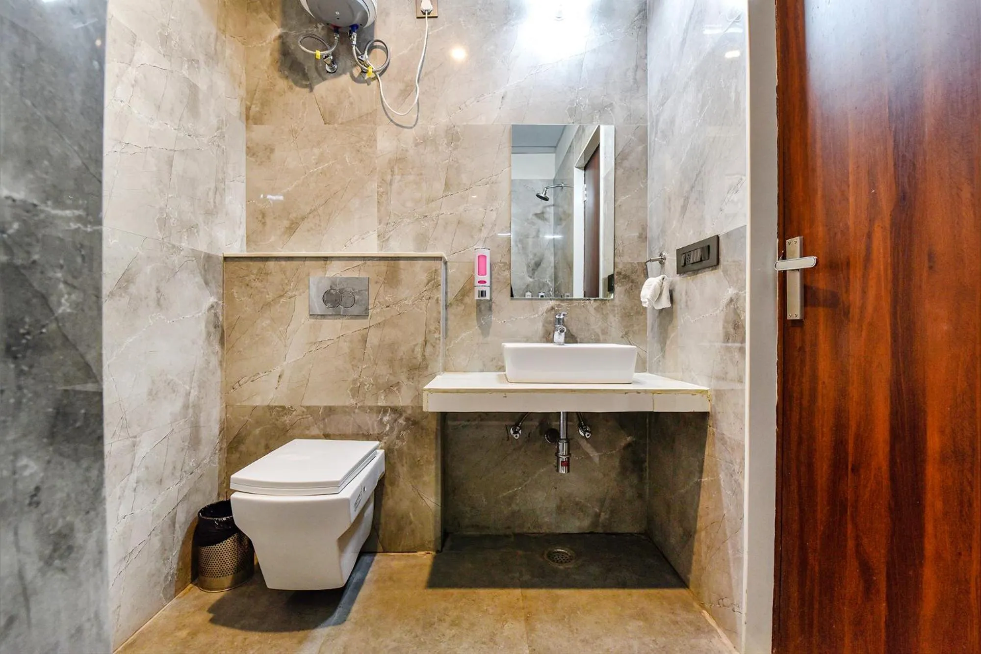 Bathroom in FabHotel Pravaasam Residency