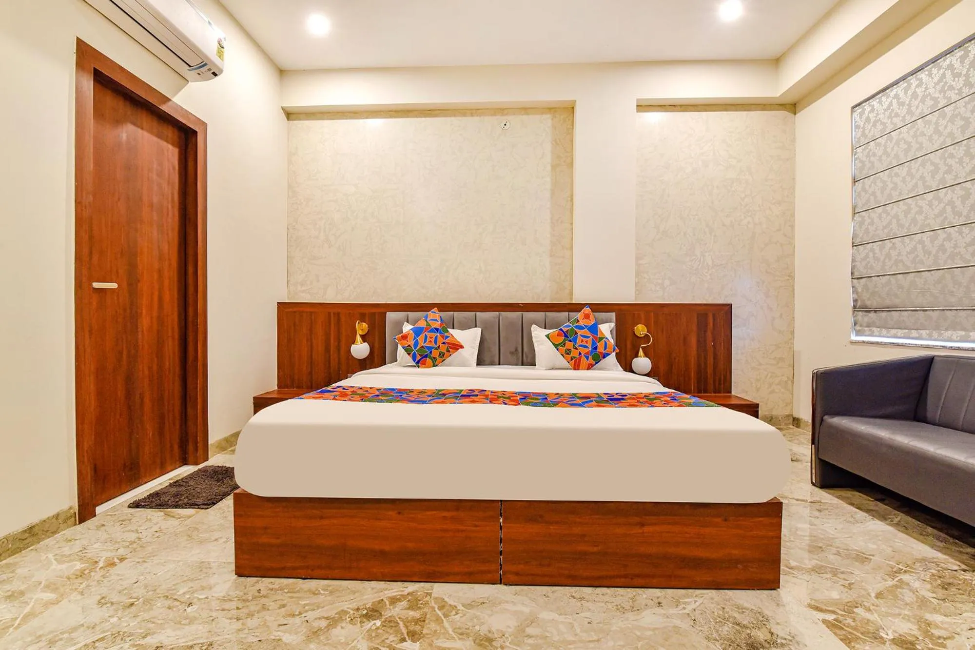 Bed in FabHotel Pravaasam Residency