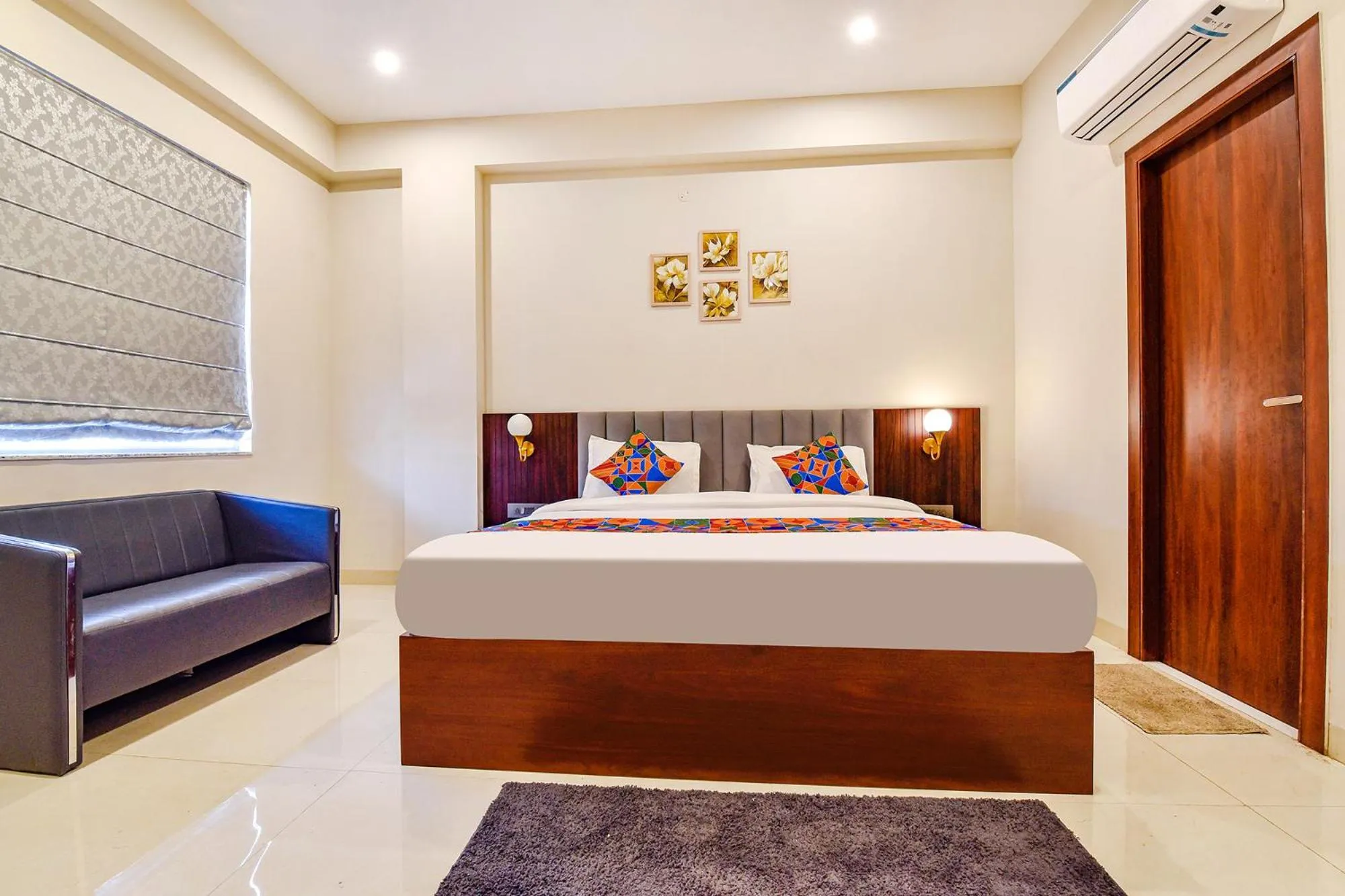 Bed in FabHotel Pravaasam Residency