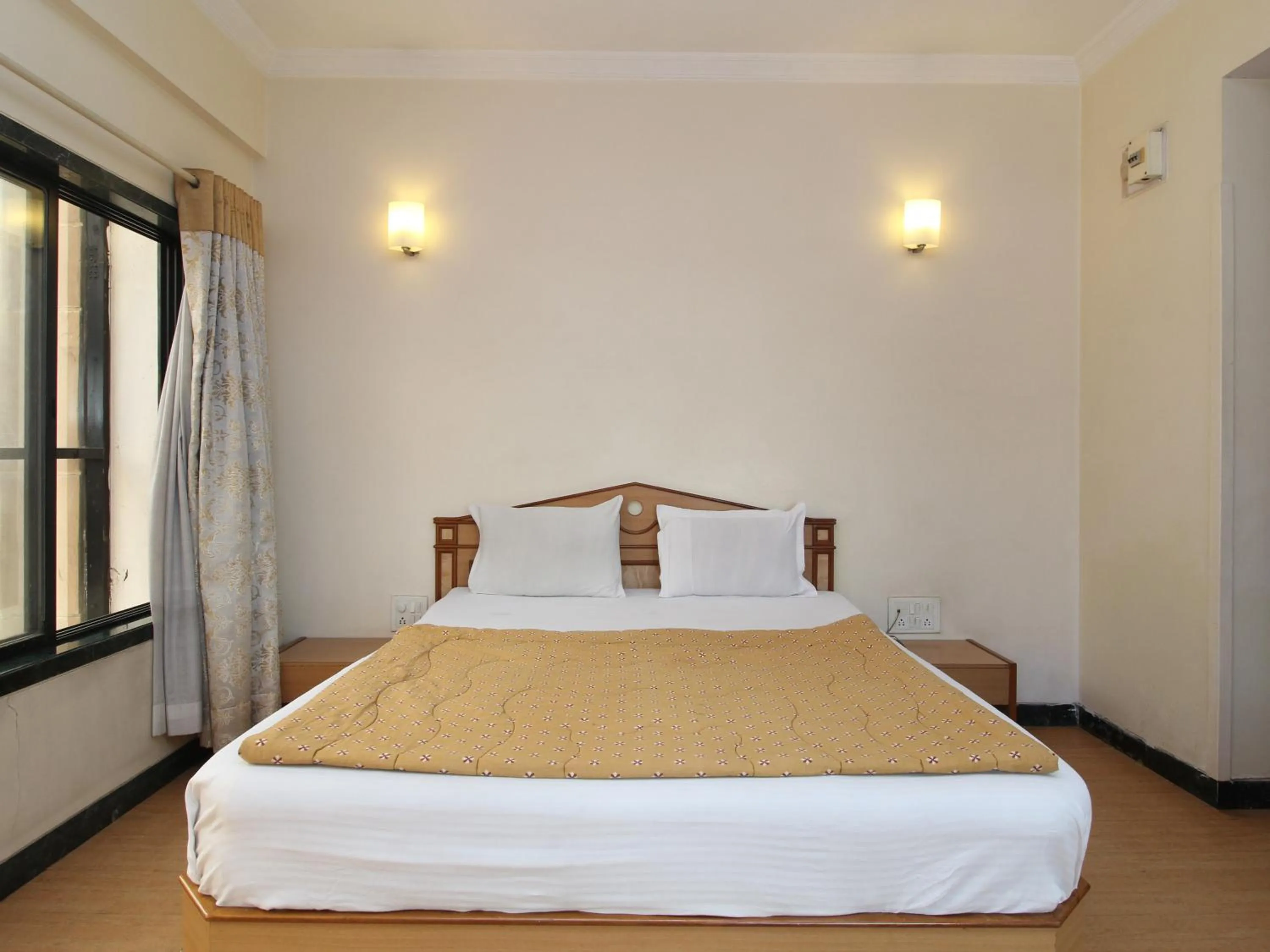 Bed in Hotel Pooja International