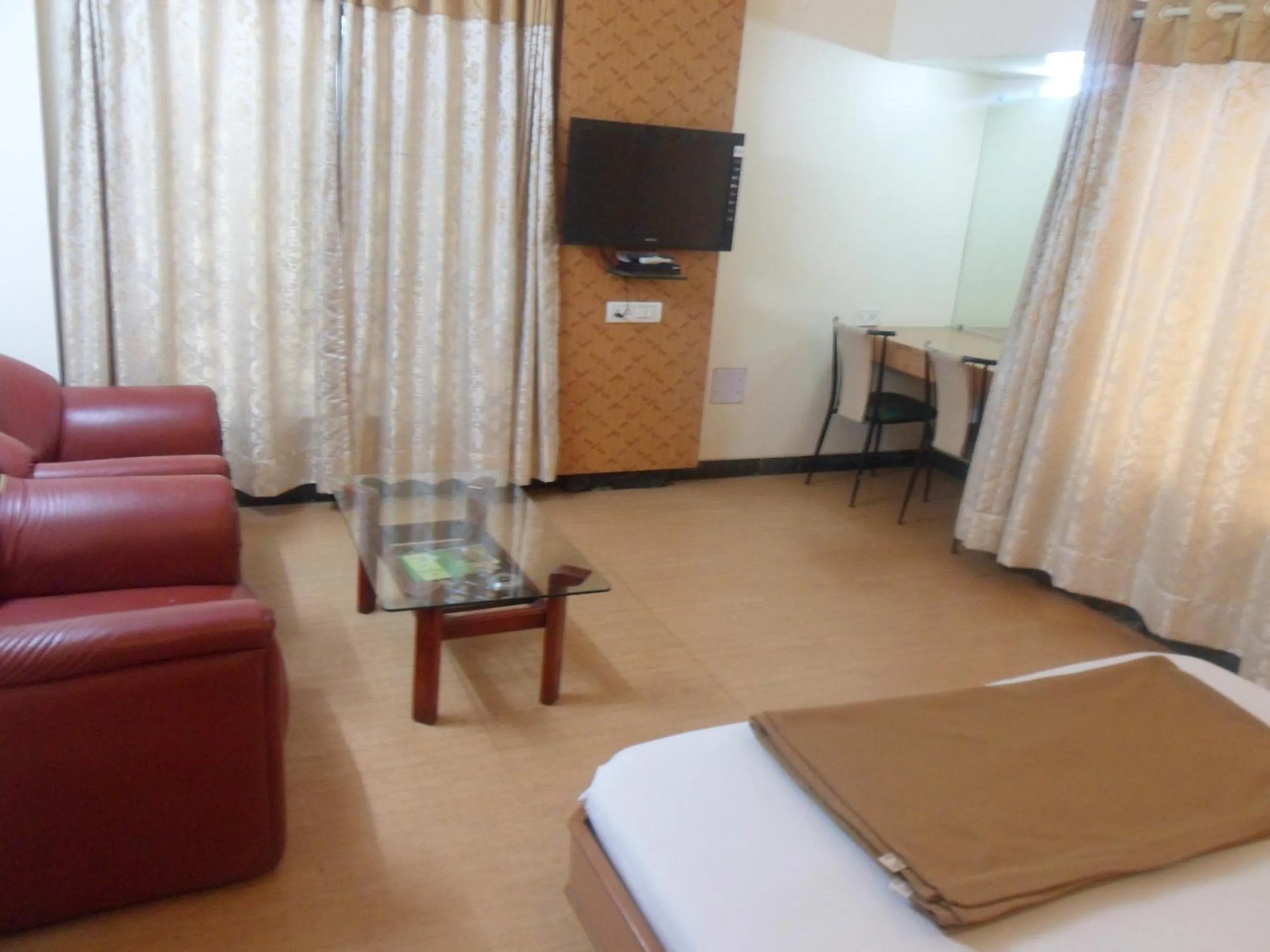 Bed in Hotel Pooja International