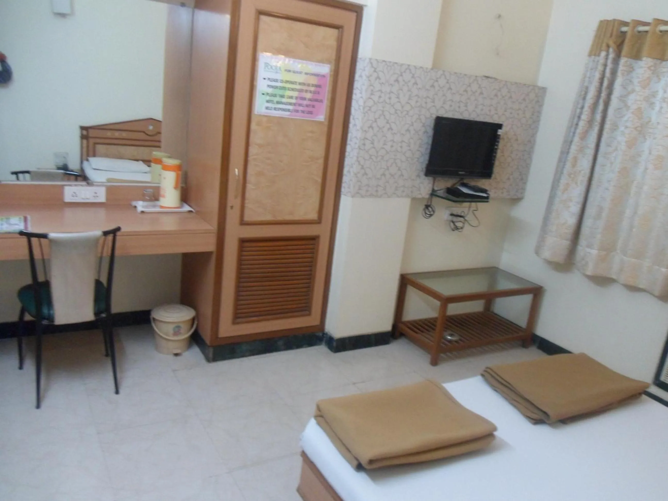 Bed in Hotel Pooja International