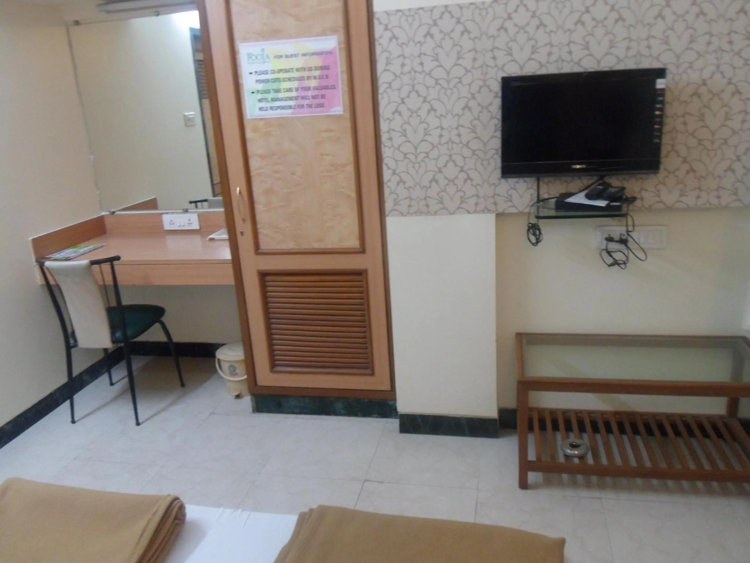 Photo of the whole room in Hotel Pooja International