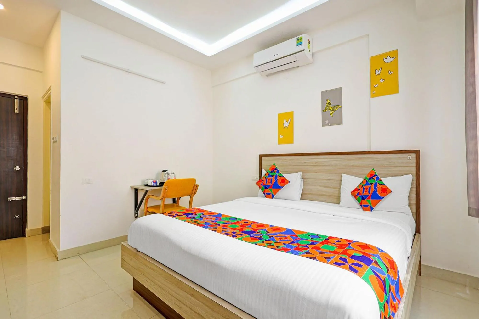 Bed in FabHotel Marella Grand Inn