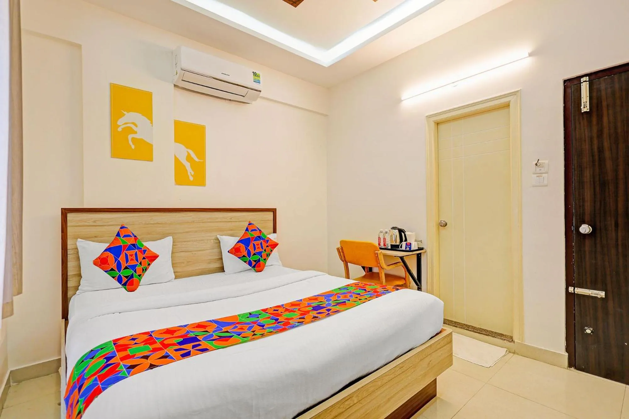Bedroom in FabHotel Marella Grand Inn