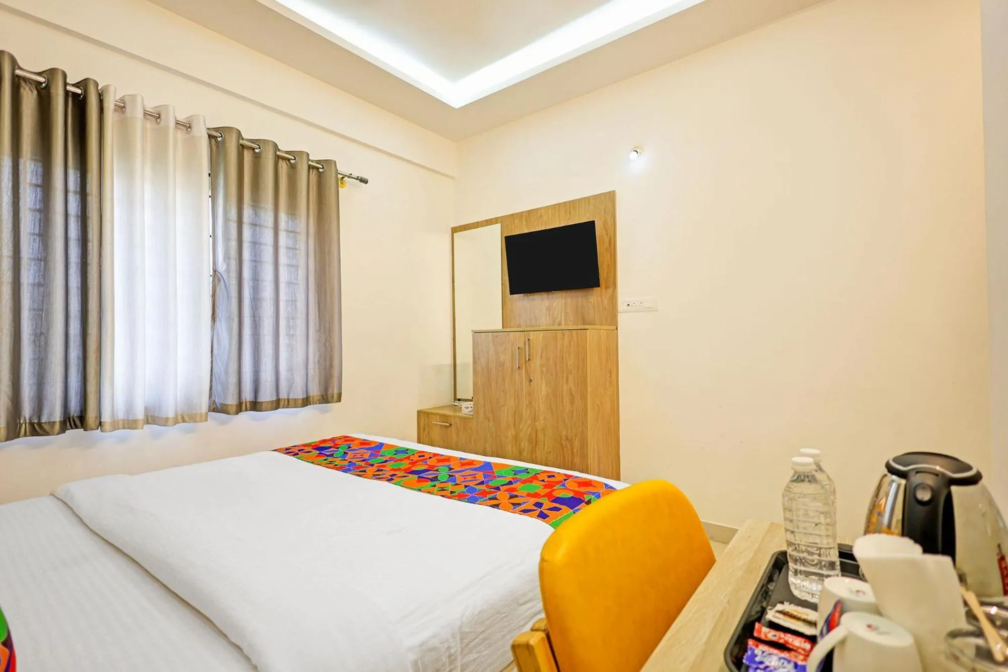 Bedroom in FabHotel Marella Grand Inn