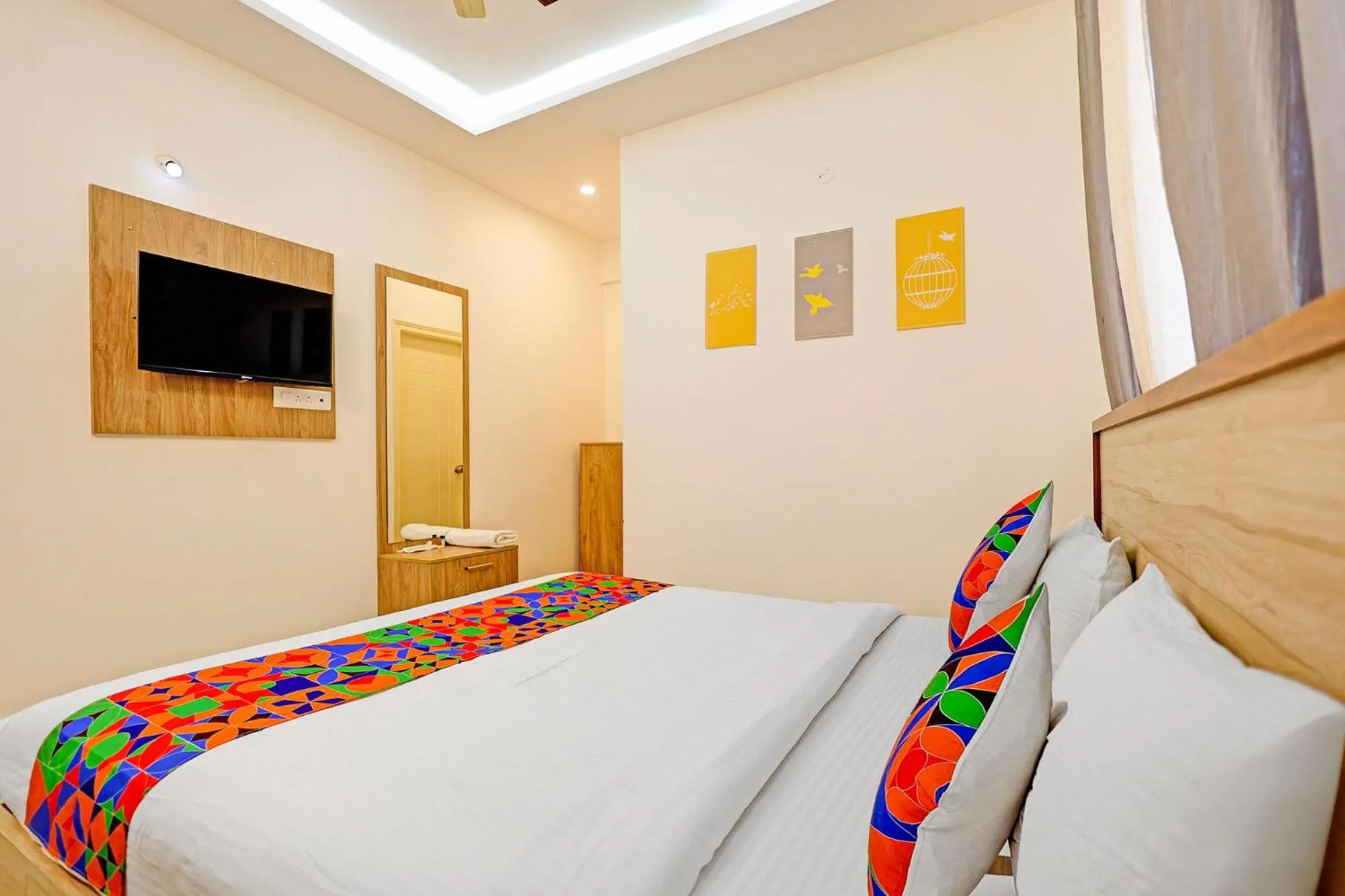 Bedroom in FabHotel Marella Grand Inn